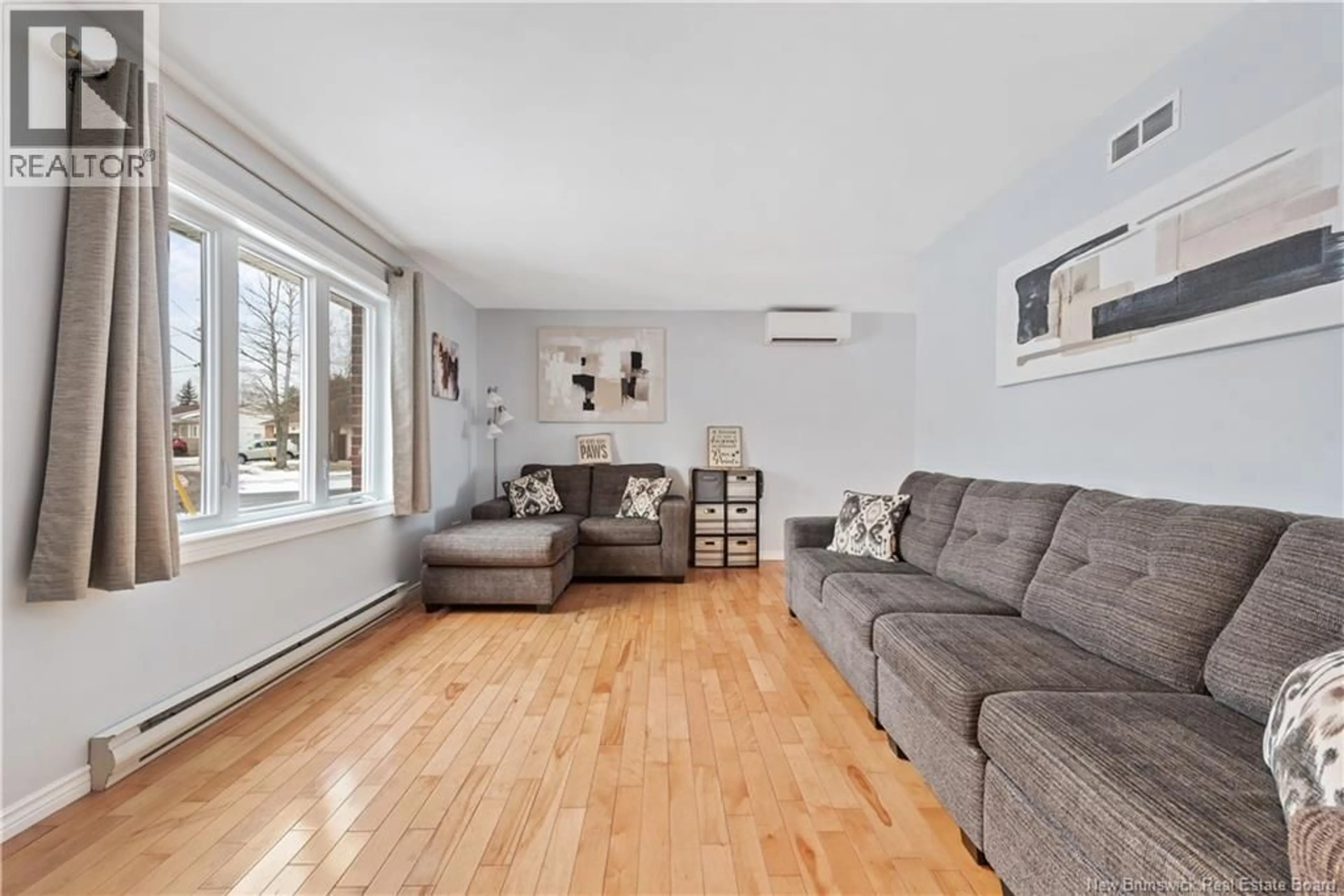 Living room with furniture, unknown for 19 BRIDLEWOOD WAY, Moncton New Brunswick E1G2H2