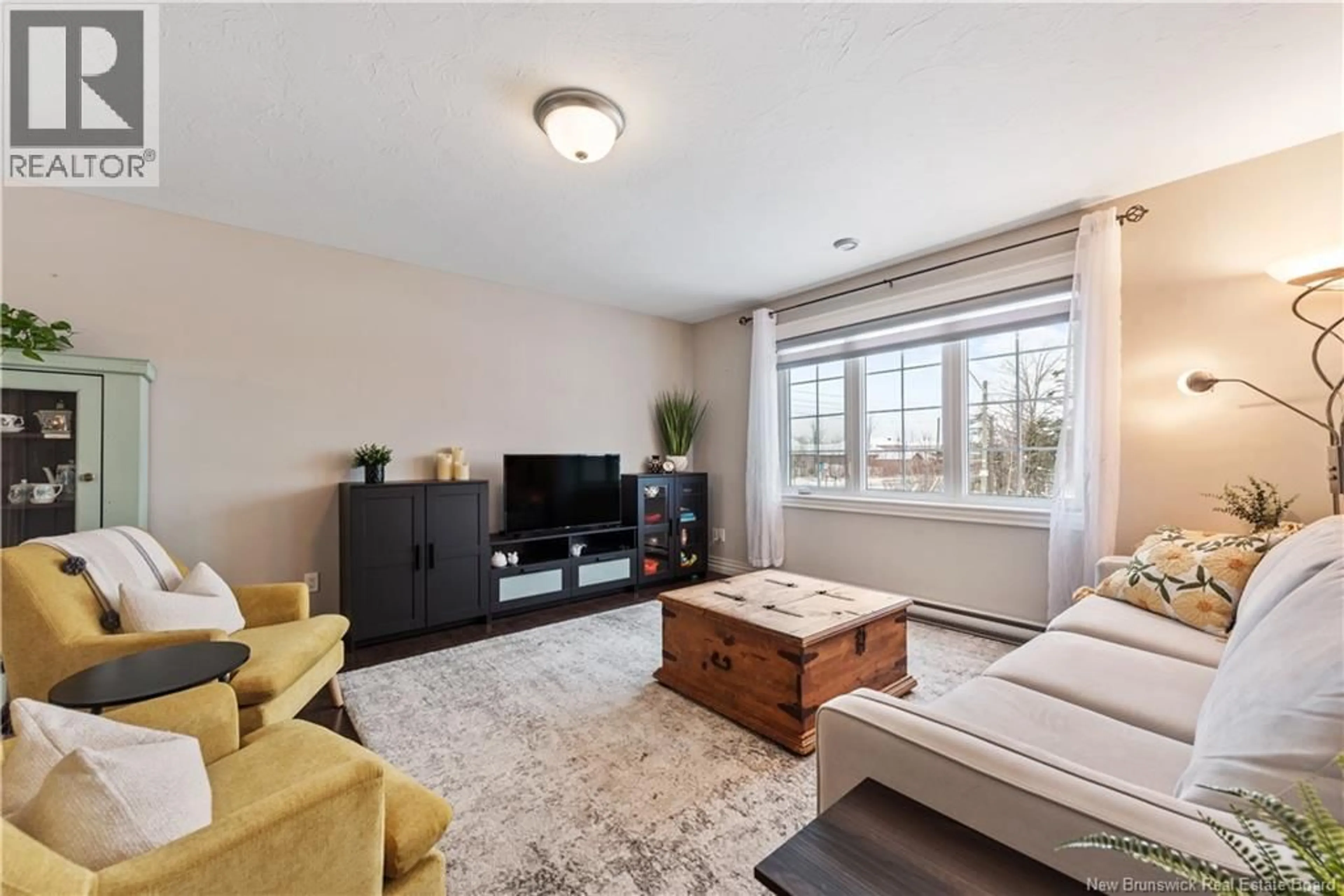 Living room with furniture, unknown for 98 O'NEILL STREET, Moncton New Brunswick E1A9M1