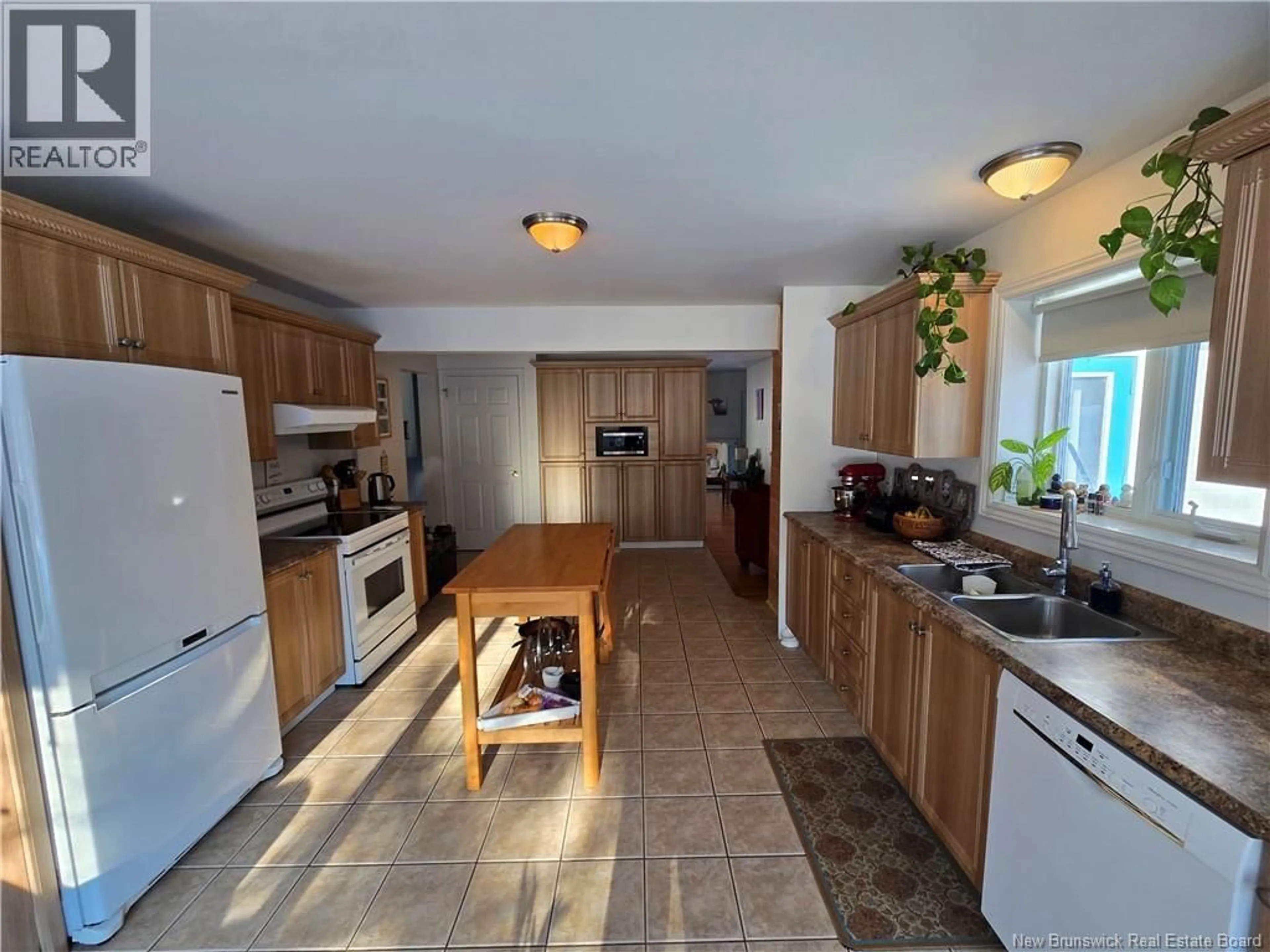Open concept kitchen, ceramic/tile floor for 11 SUZAN STREET, North Tetagouche New Brunswick E2A4Y9