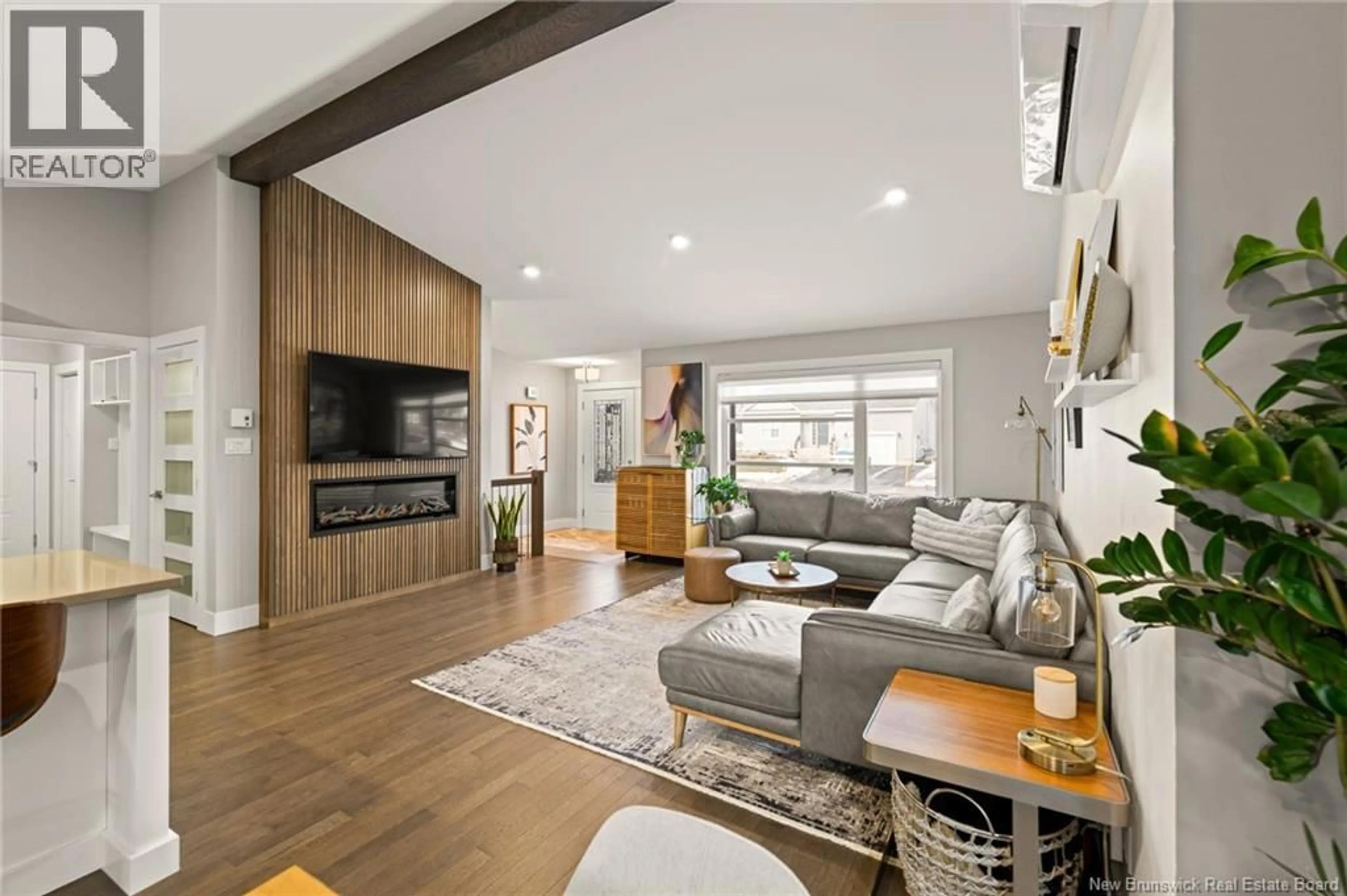 Living room with furniture, wood/laminate floor for 44 SAMSON STREET, Moncton New Brunswick E1G0Z4