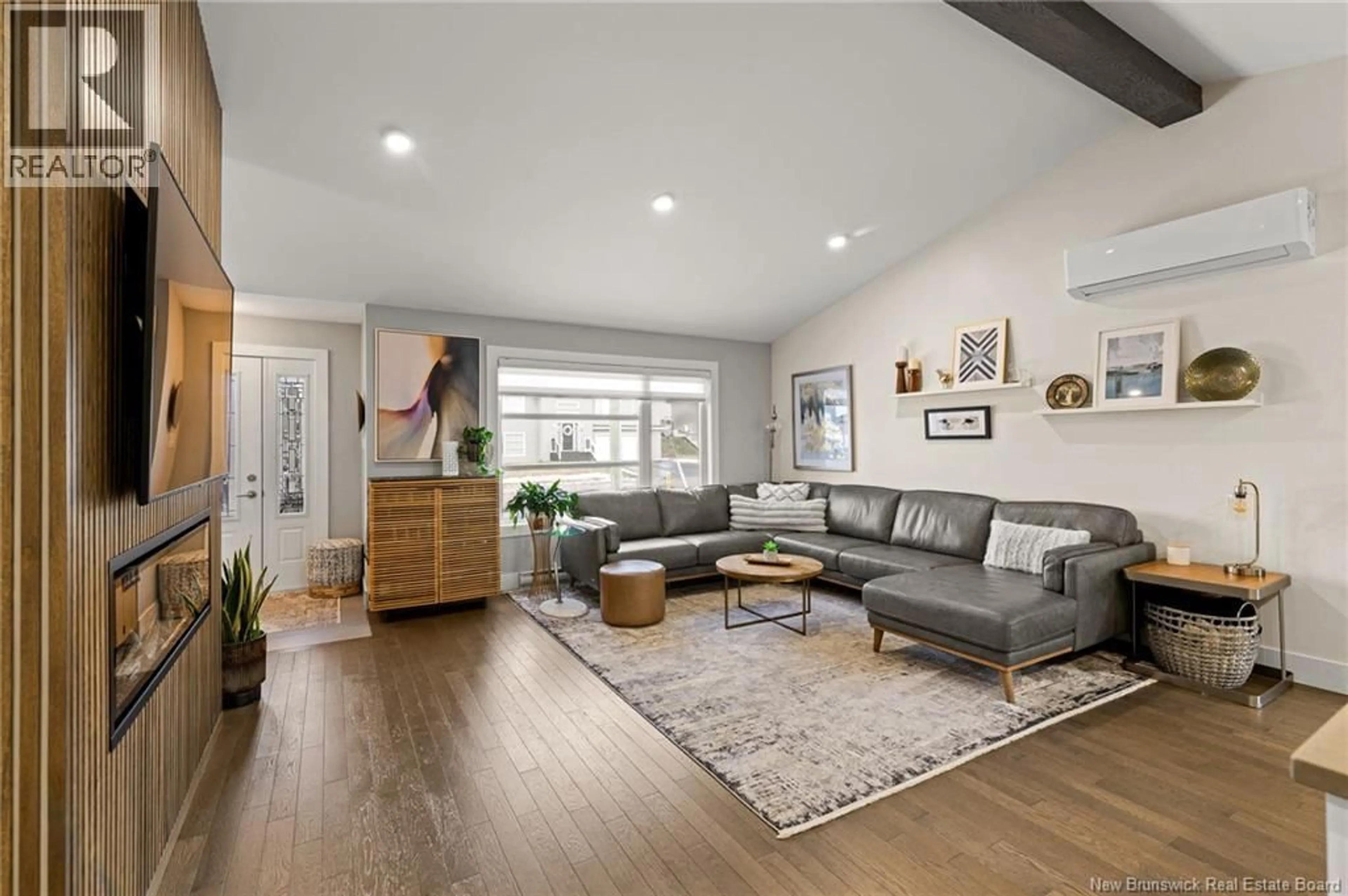 Living room with furniture, wood/laminate floor for 44 SAMSON STREET, Moncton New Brunswick E1G0Z4