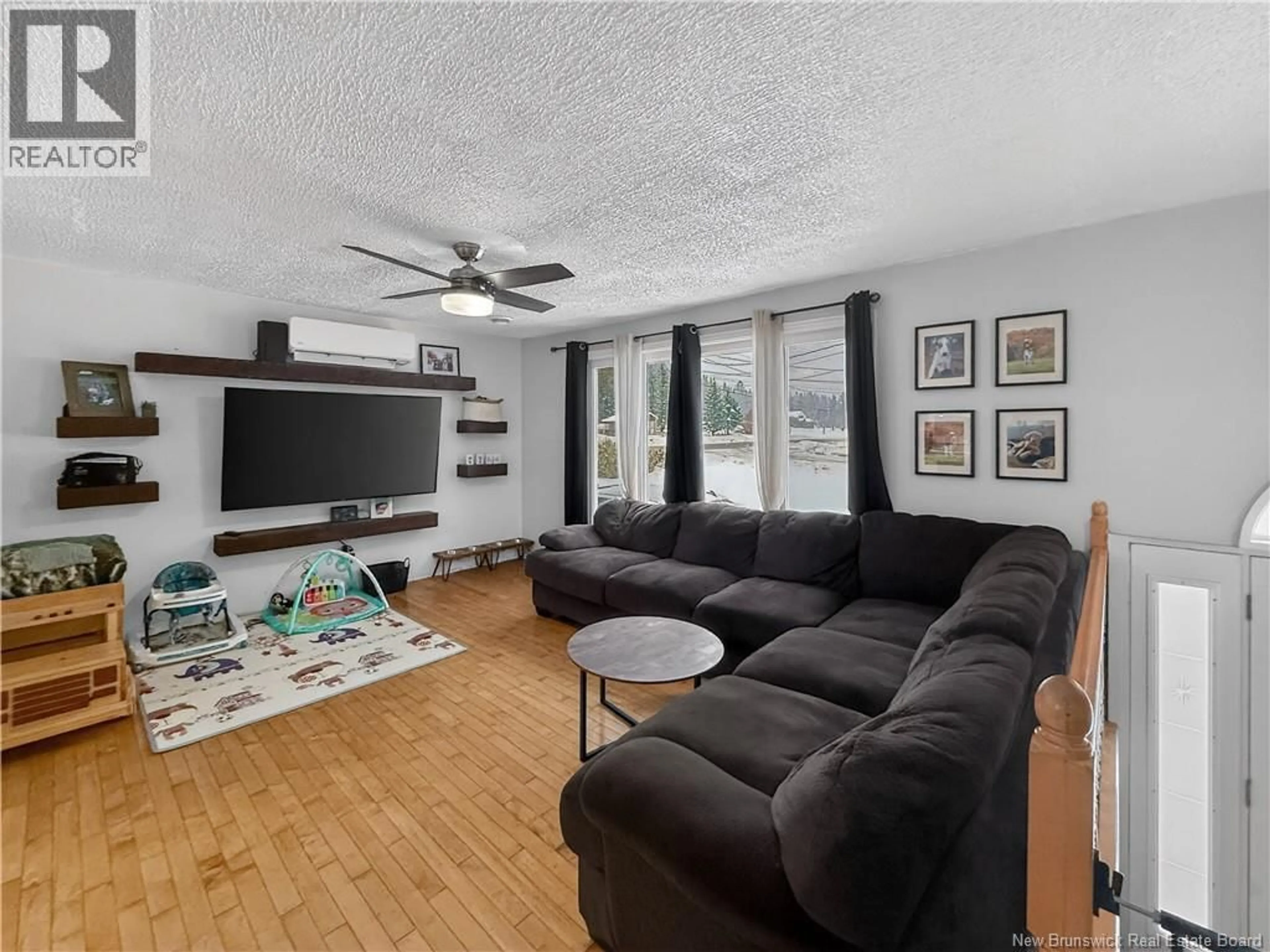 Living room with furniture, wood/laminate floor for 13888 ROUTE 17, Glen Levit New Brunswick E3N4V8