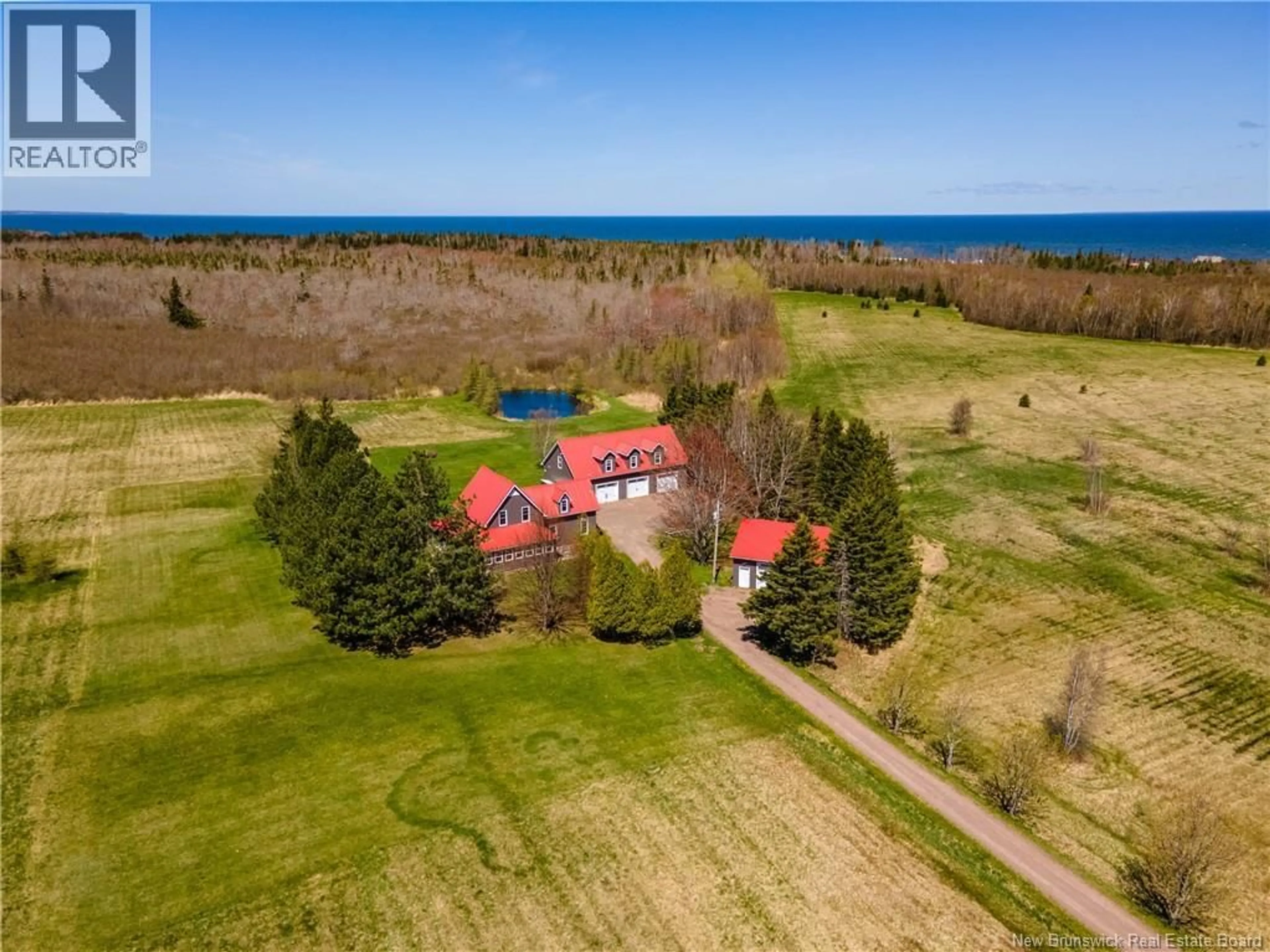 A pic from outside/outdoor area/front of a property/back of a property/a pic from drone, water/lake/river/ocean view for 2069 ROUTE 955, Little Shemogue New Brunswick E4M3K2
