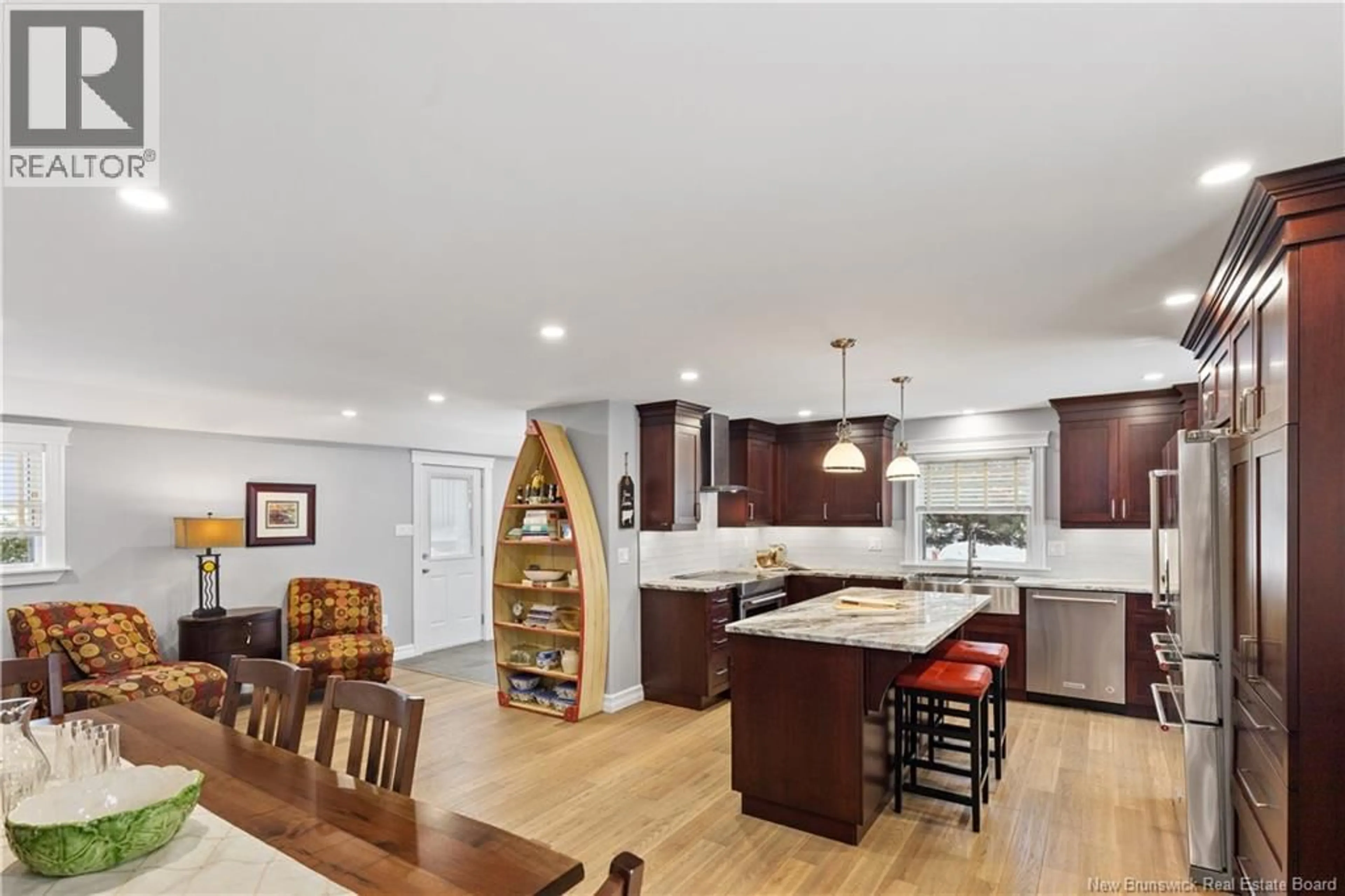 Open concept kitchen, wood/laminate floor for 2069 ROUTE 955, Little Shemogue New Brunswick E4M3K2