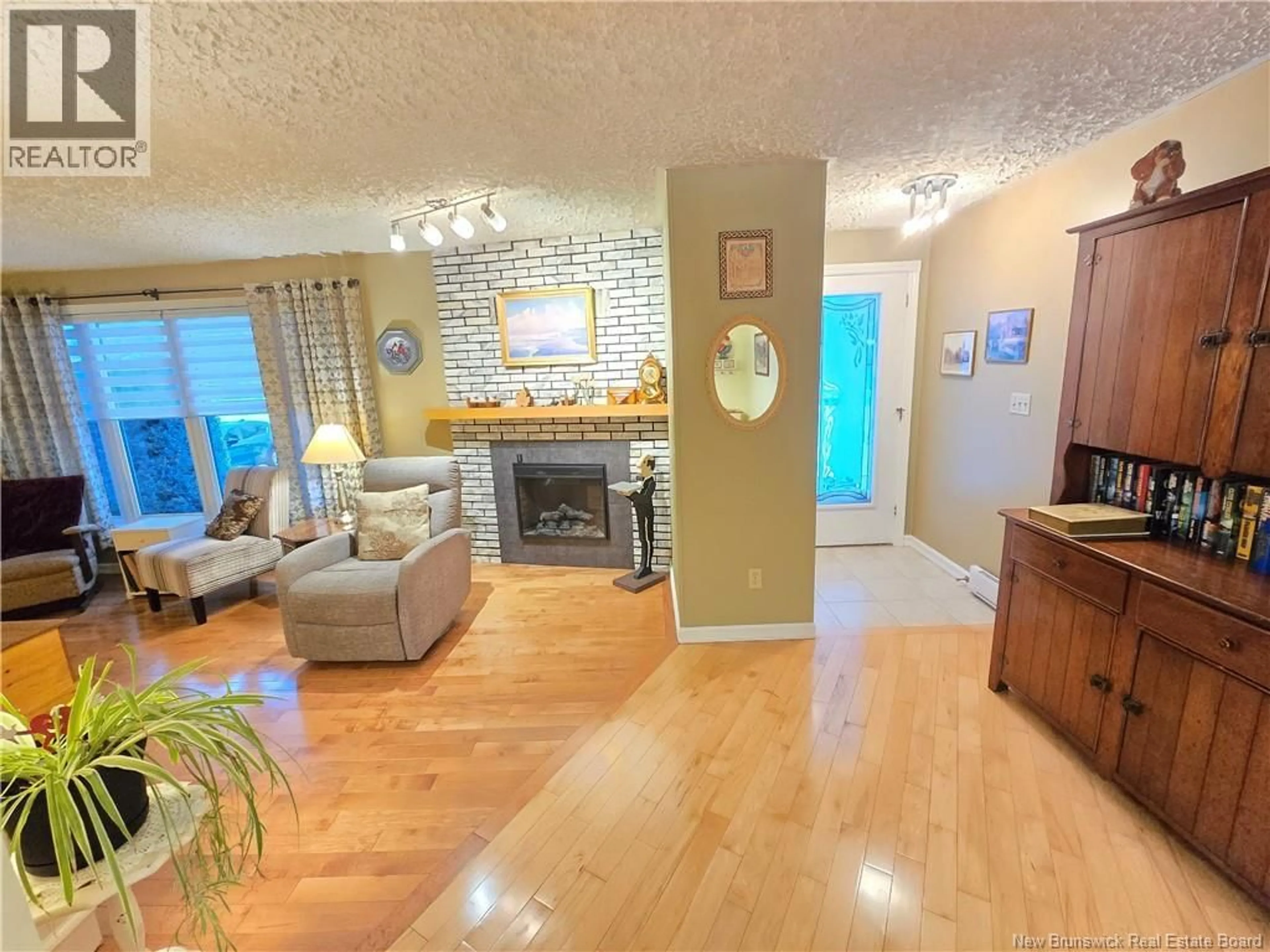 Living room with furniture, unknown for 225 ROUTE 160, Allardville New Brunswick E8L1J1