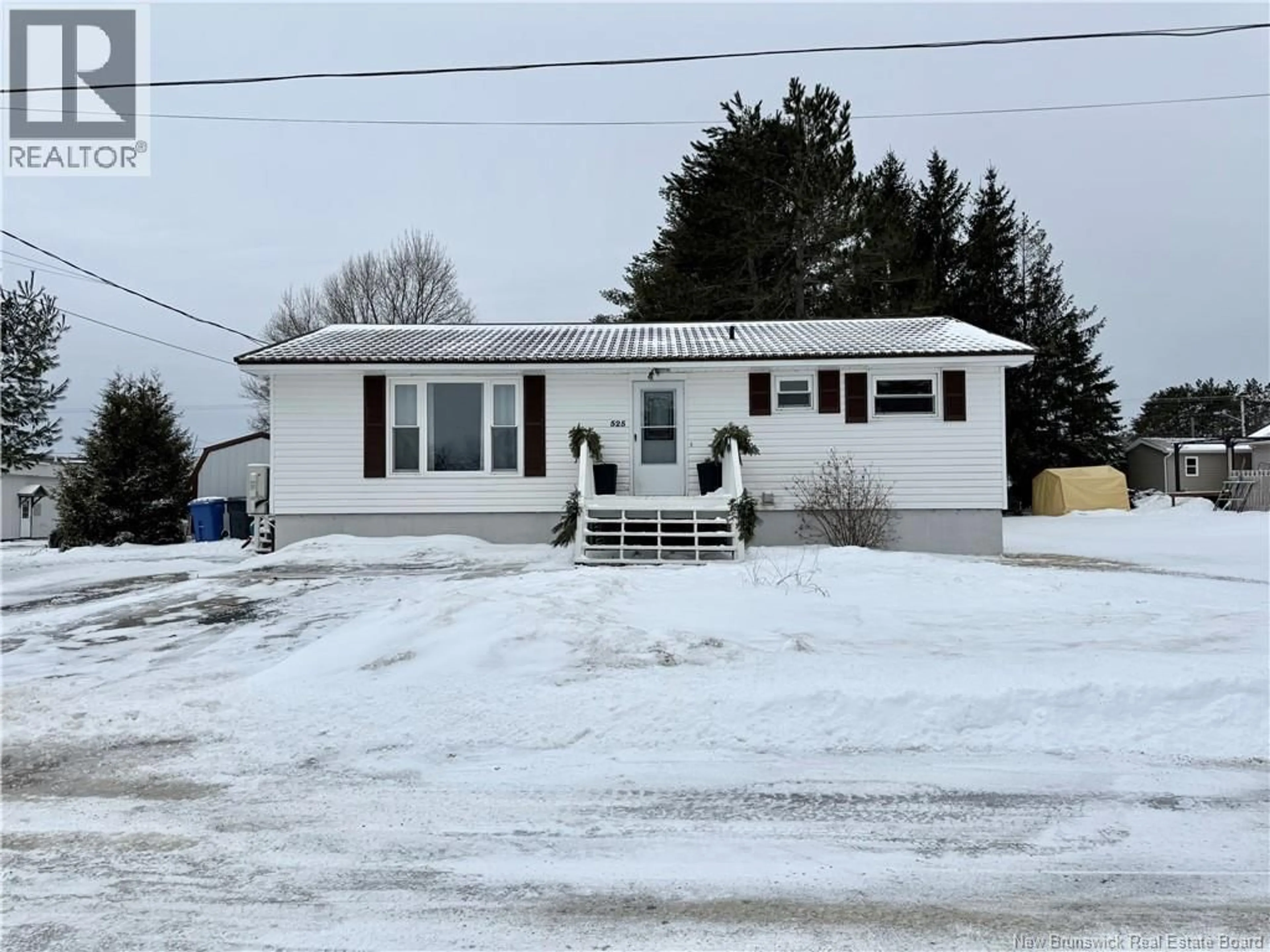Home with vinyl exterior material, street for 525 FLYNN LANE, Miramichi New Brunswick E1V3S2