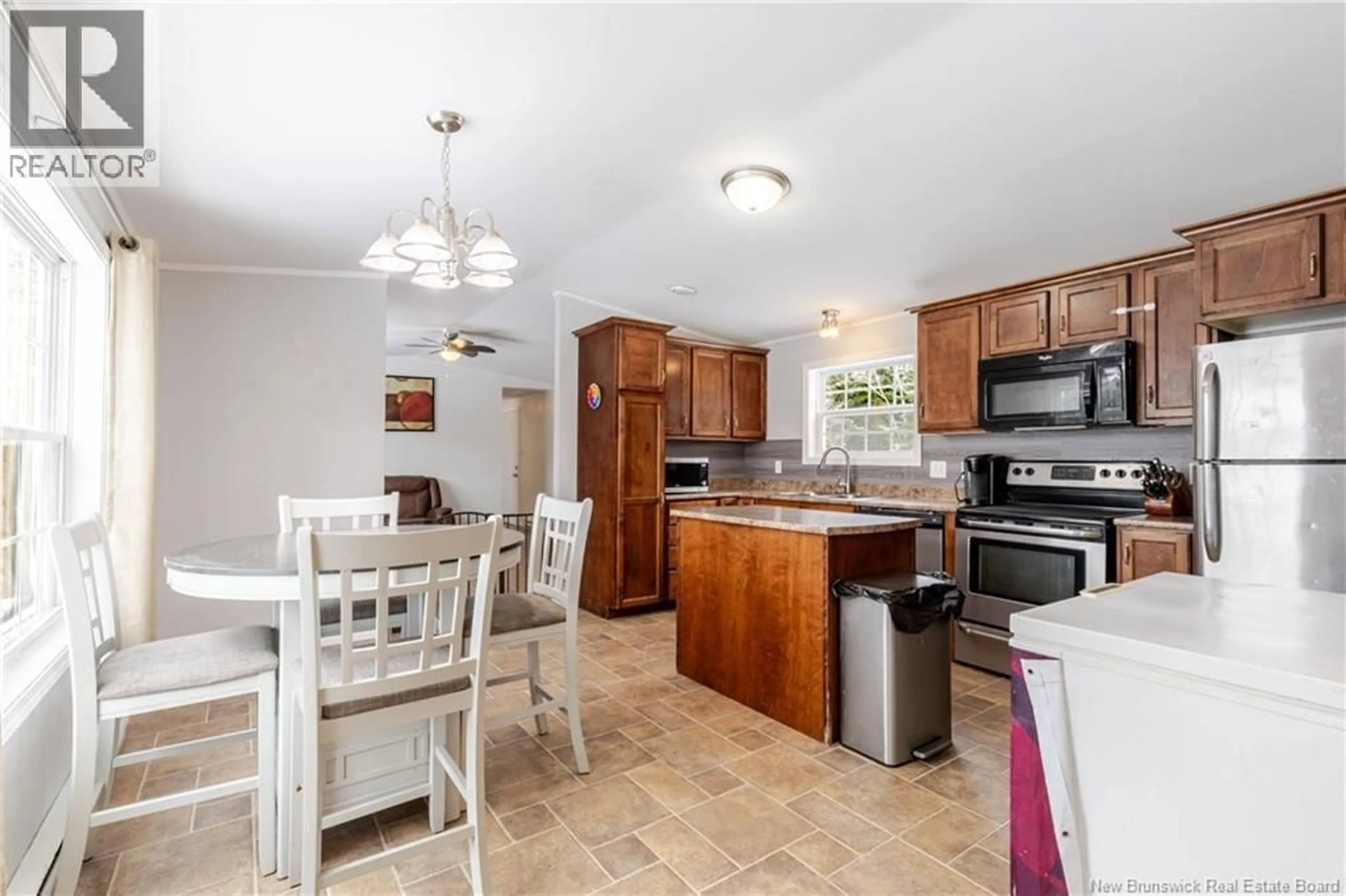 Open concept kitchen, ceramic/tile floor for 11 CLARA STREET, Rusagonis New Brunswick E3B0T8