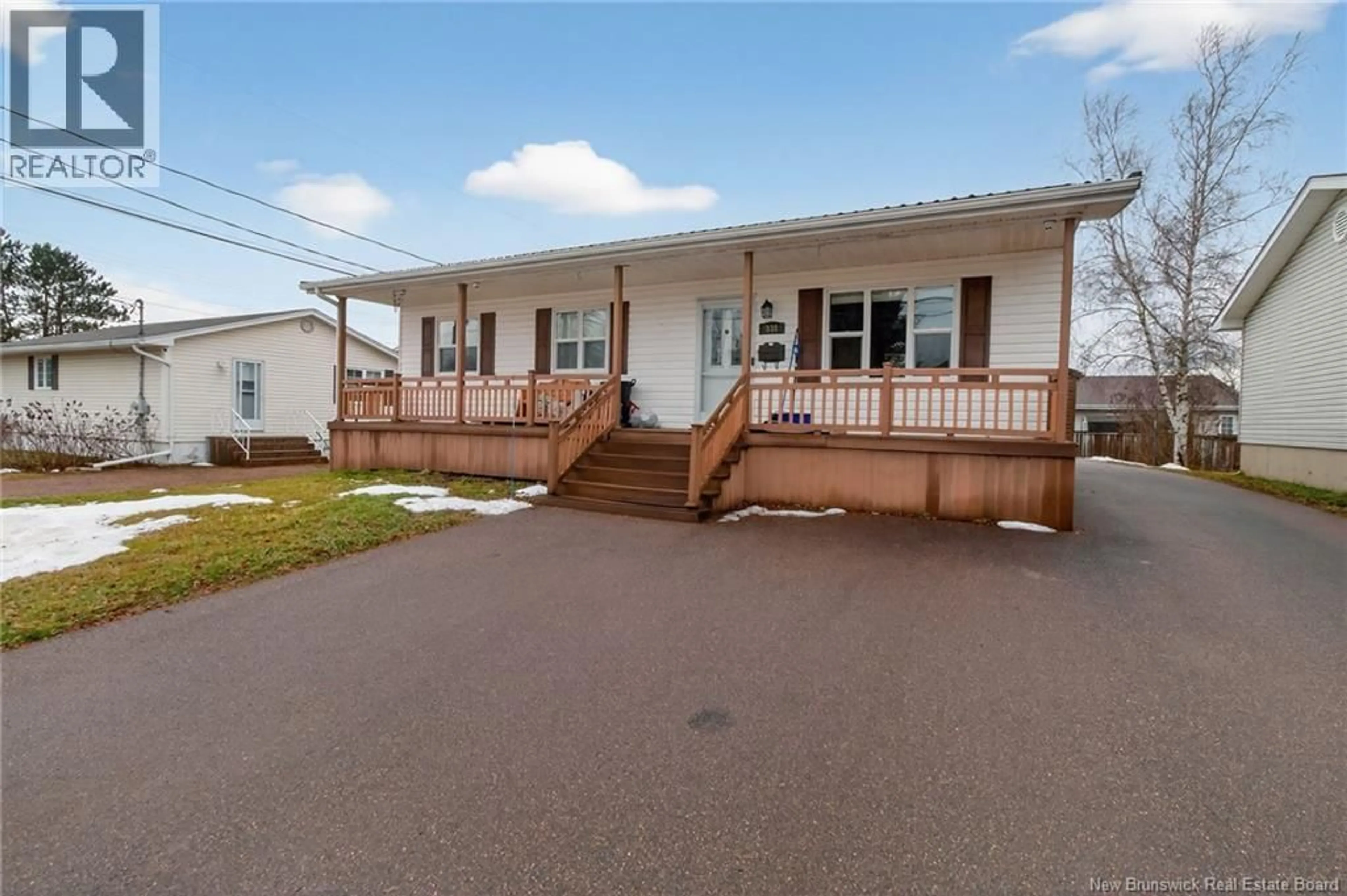 Home with vinyl exterior material, street for 338 SAINTE CROIX STREET, Dieppe New Brunswick E1A1Y7