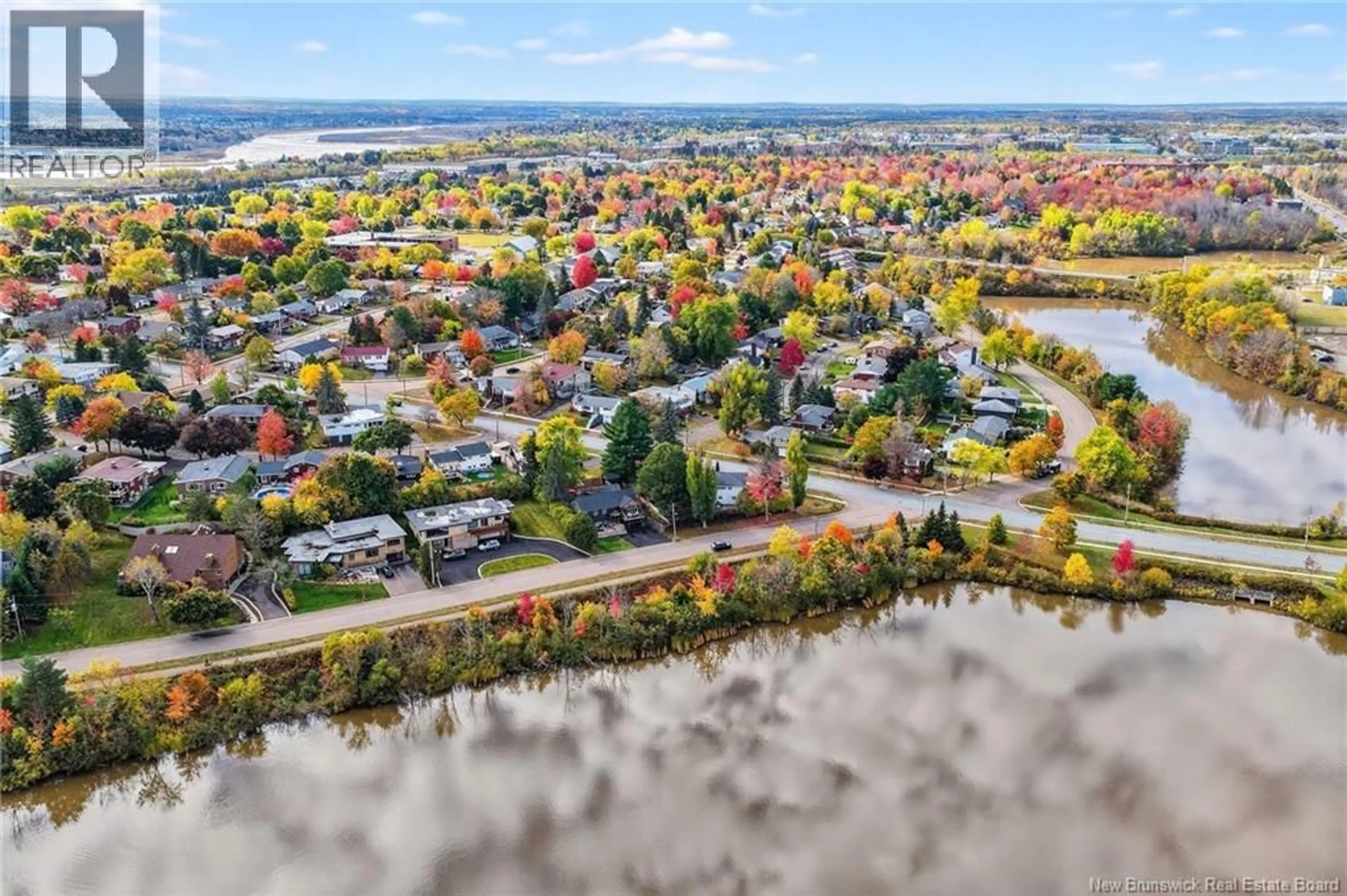 A pic from outside/outdoor area/front of a property/back of a property/a pic from drone, water/lake/river/ocean view for 300 WESTMOUNT BOULEVARD, Moncton New Brunswick E1E1V5