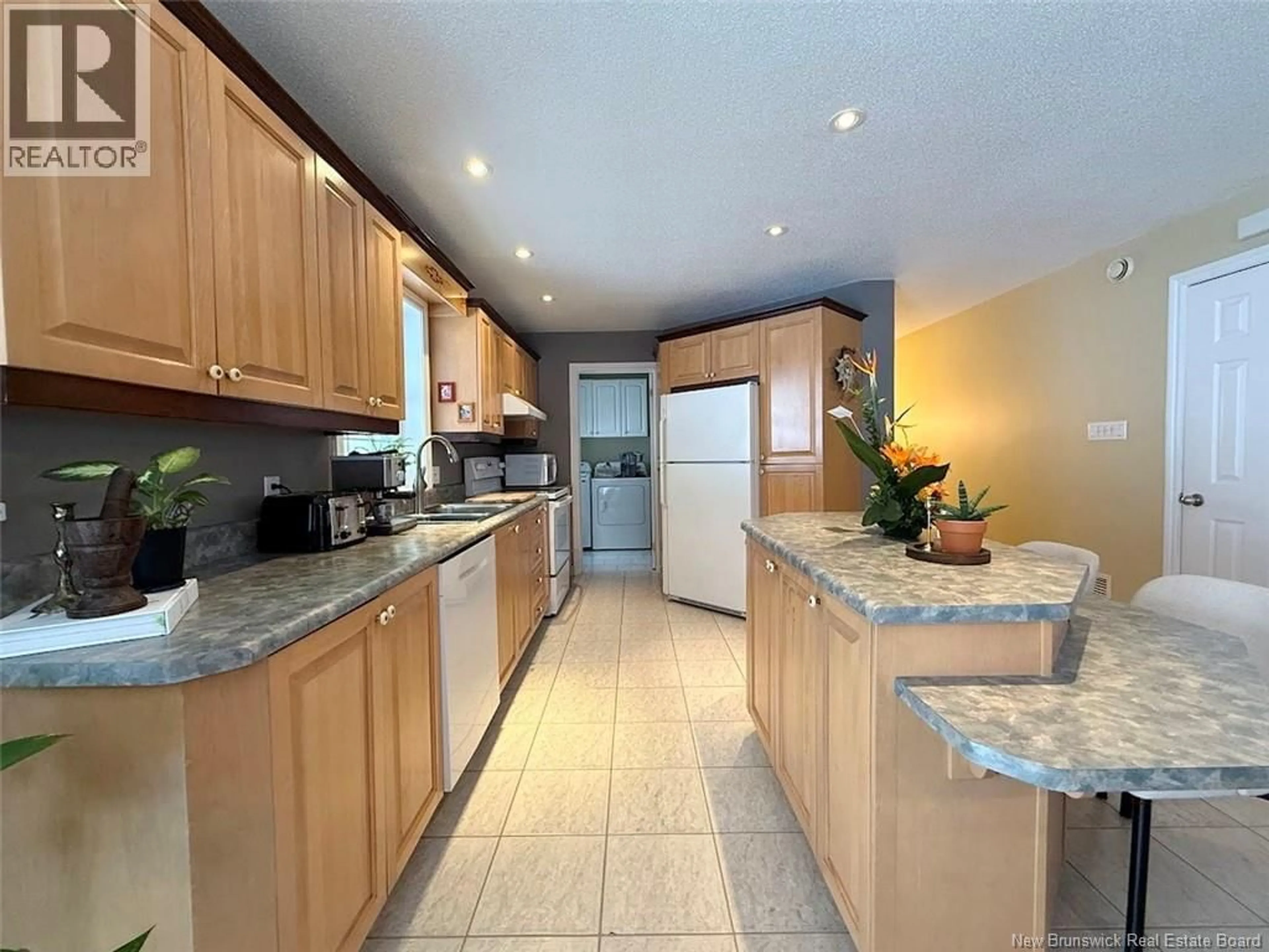 Open concept kitchen, ceramic/tile floor for 45 CASTONGUAY ROAD, Saint-Jacques New Brunswick E7B2B3