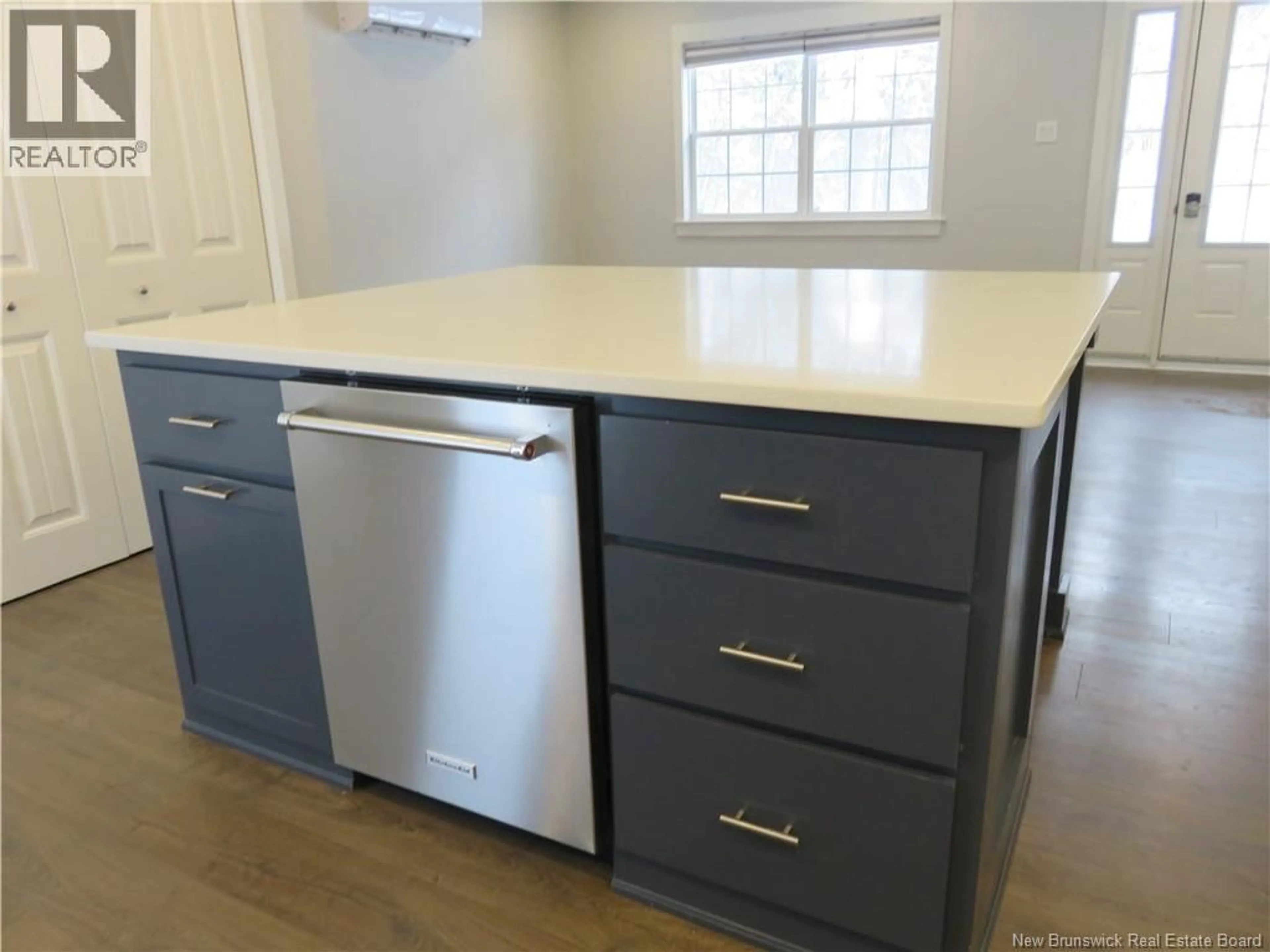 Open concept kitchen, wood/laminate floor for 110 MODEL FARM ROAD, Quispamsis New Brunswick E2E4Z8