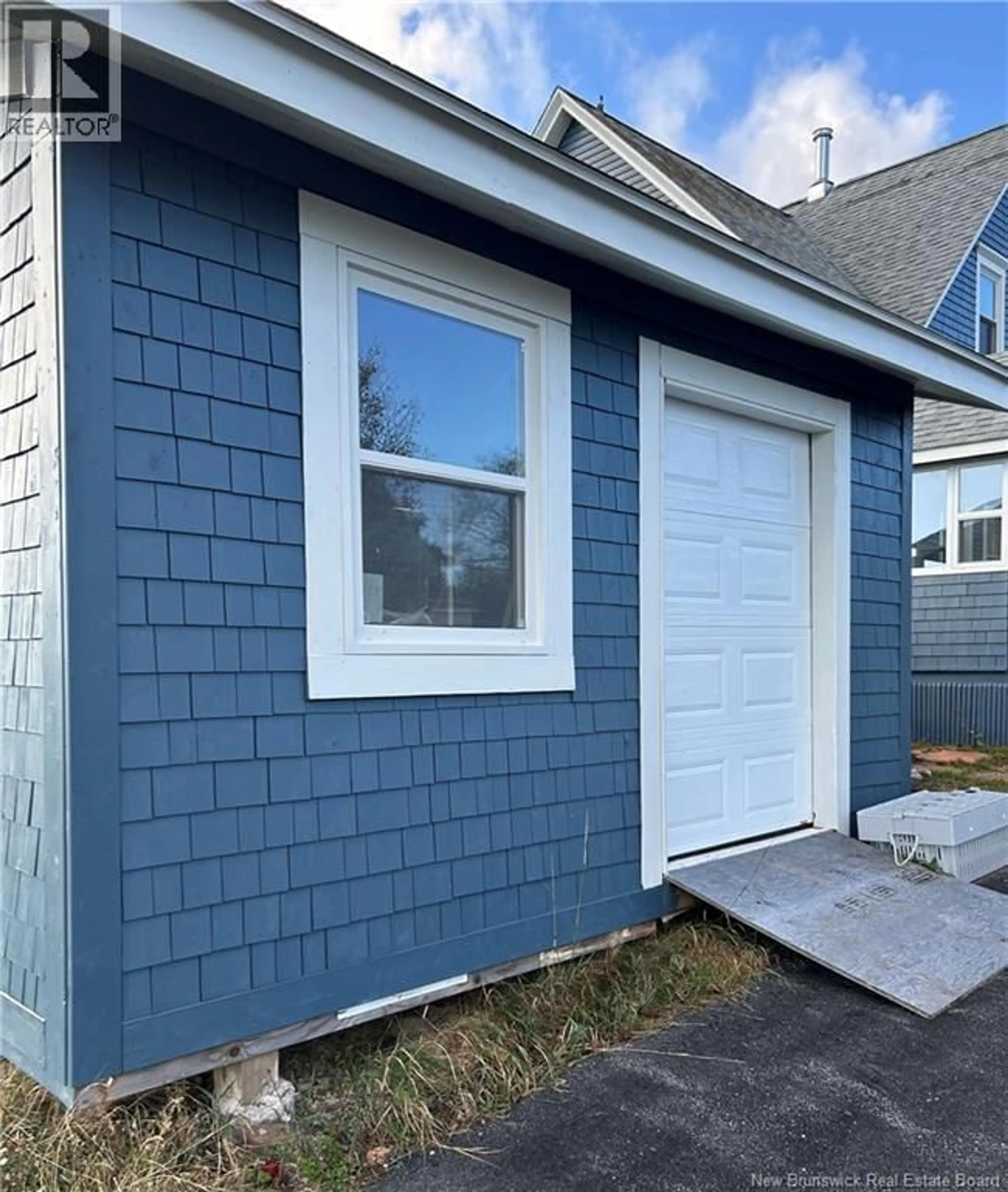 Home with vinyl exterior material, street for 1171 ROUTE 776, Grand Manan Island New Brunswick E5G1G2