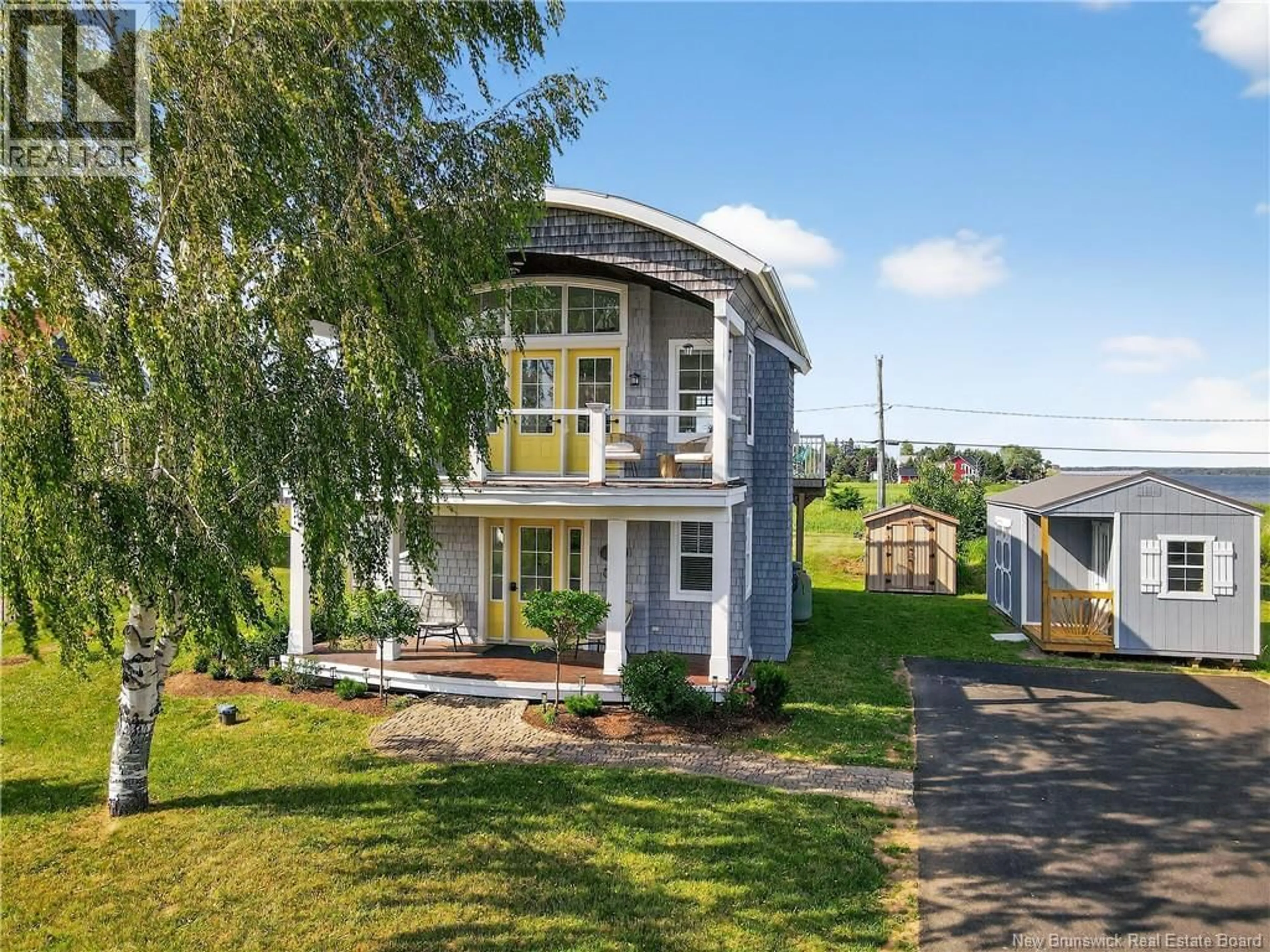 A pic from outside/outdoor area/front of a property/back of a property/a pic from drone, street for 51 ACADIE ROAD, Cocagne New Brunswick E4R5Y6