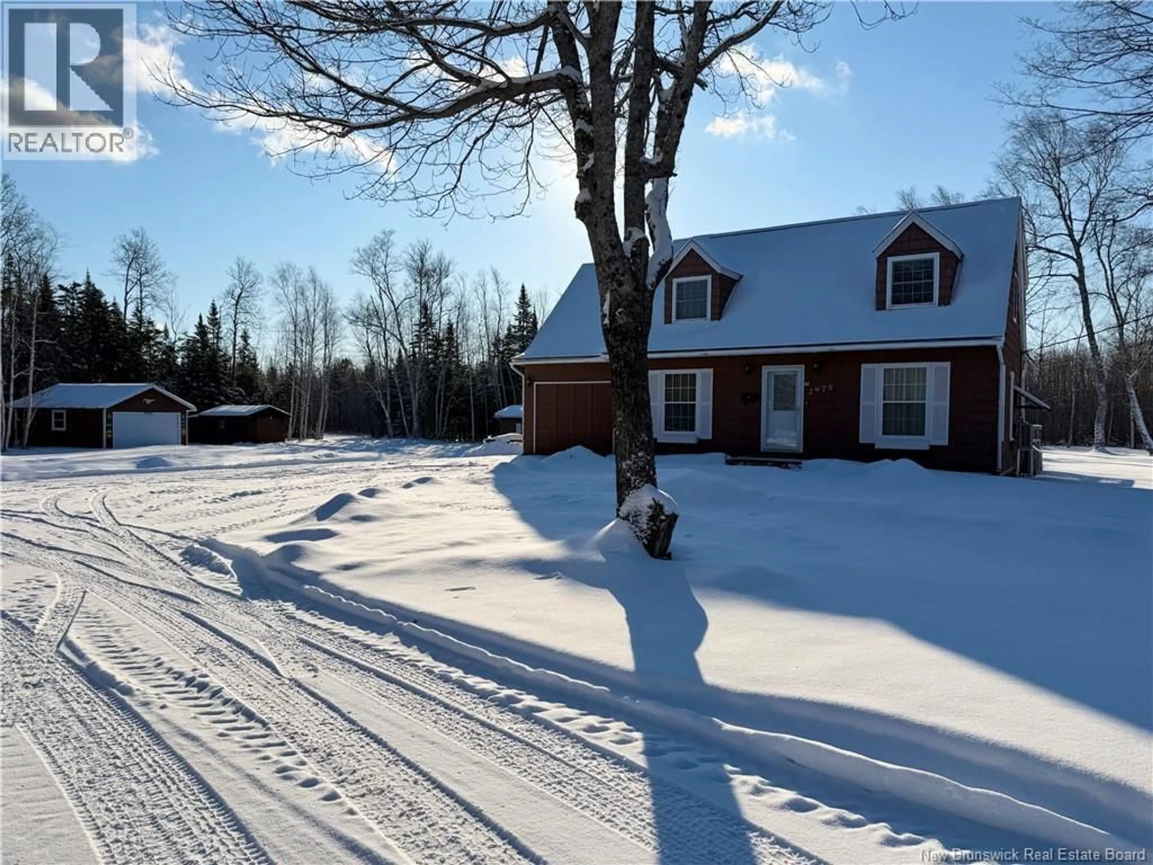 A pic from outside/outdoor area/front of a property/back of a property/a pic from drone, street for 2975 ROUTE 180, South Tetagouche New Brunswick E2A7B9
