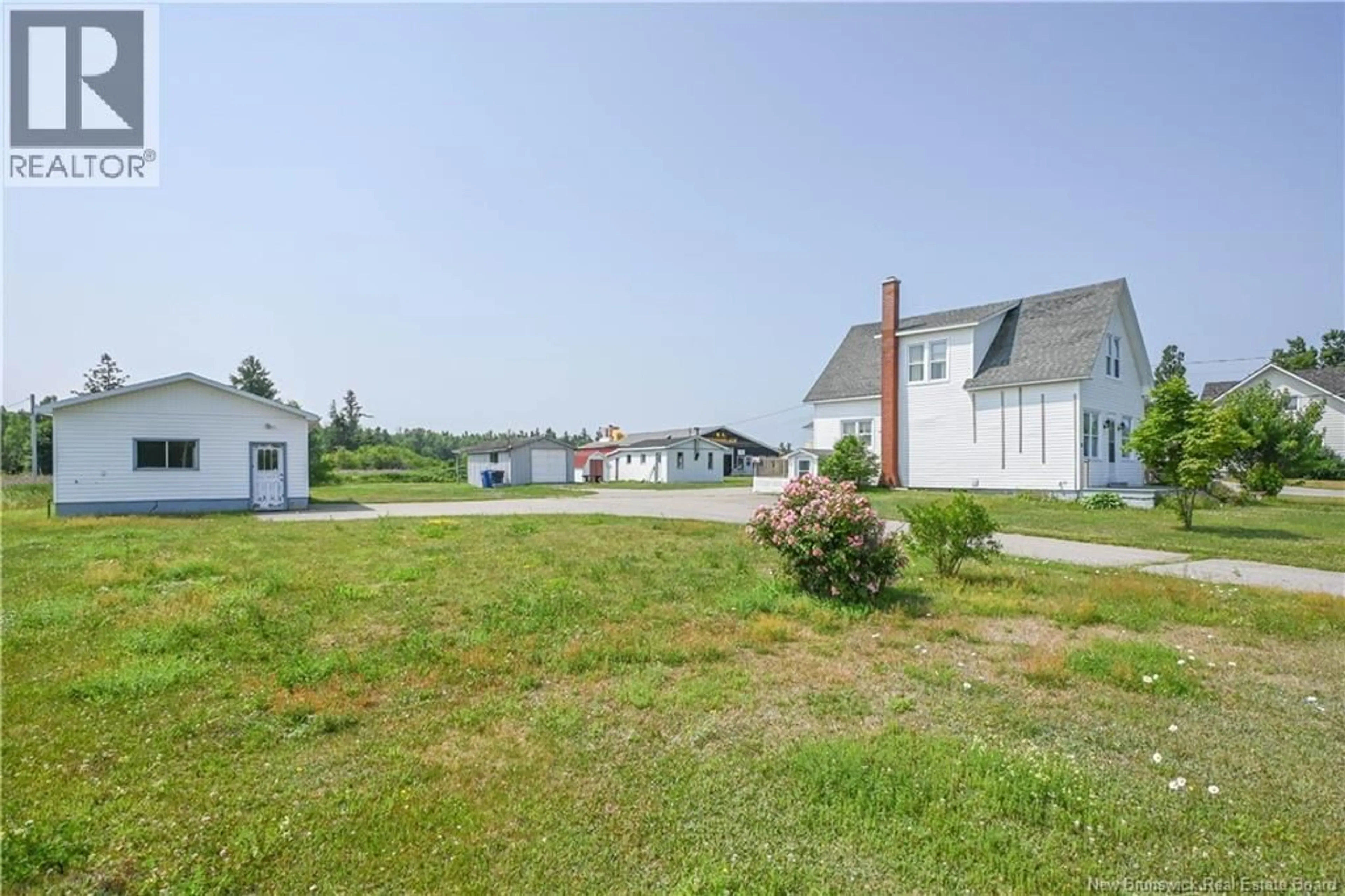 A pic from outside/outdoor area/front of a property/back of a property/a pic from drone, unknown for 7934 SAINT-PAUL STREET, Bas-Caraquet New Brunswick E1W6E1