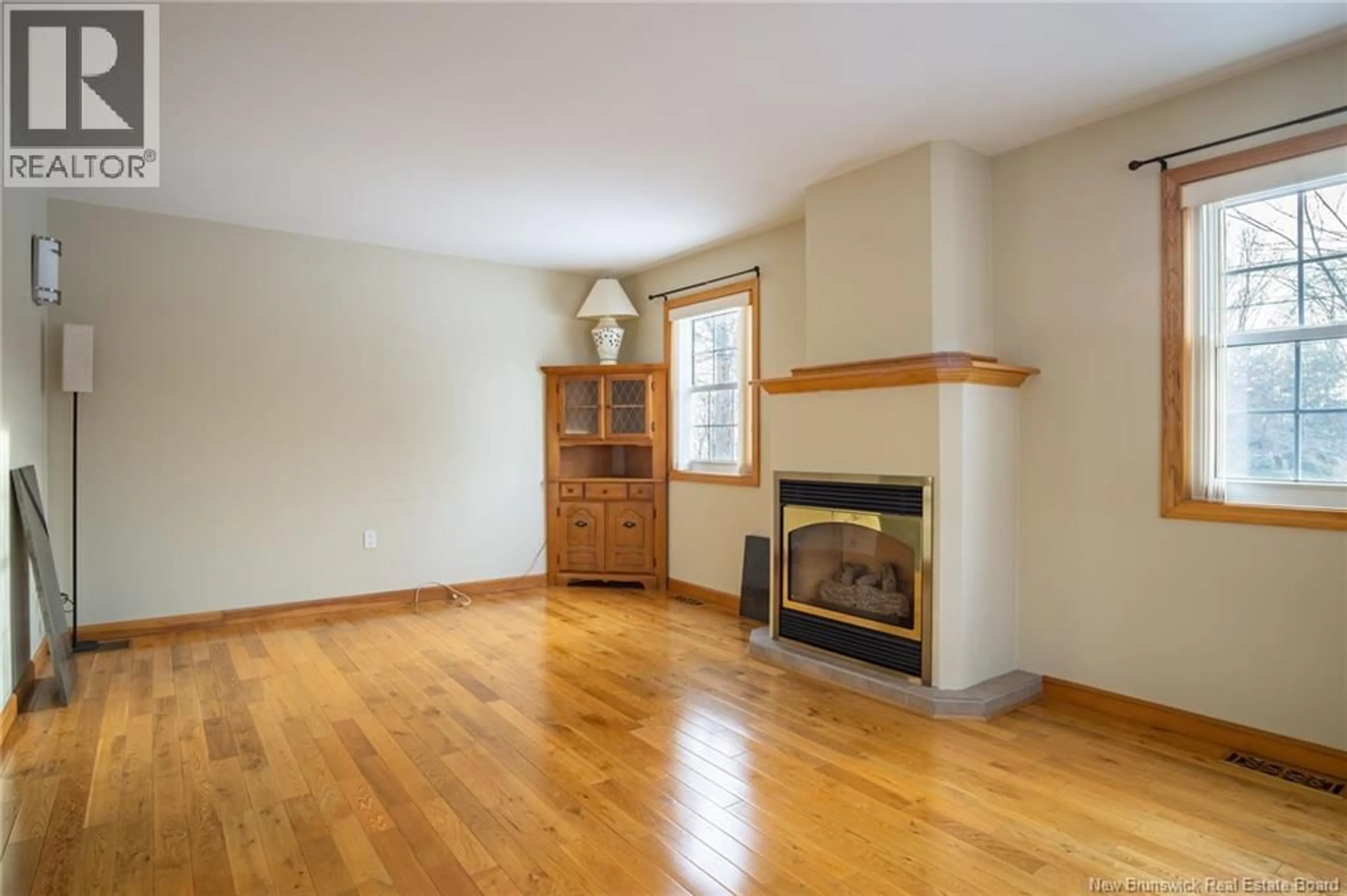 Living room with furniture, wood/laminate floor for 1 CLARK COURT, St. Stephen New Brunswick E3L3E4