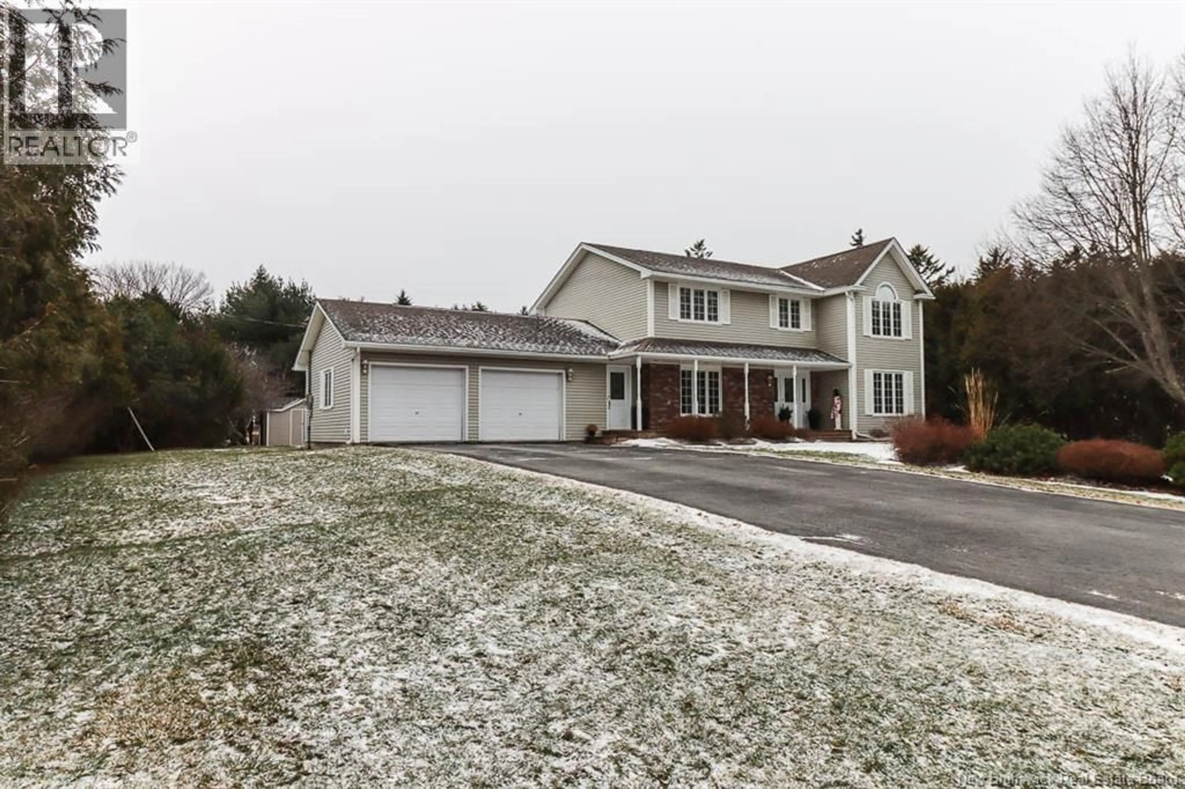 A pic from outside/outdoor area/front of a property/back of a property/a pic from drone, street for 54 DONLYN DRIVE, Rothesay New Brunswick E2E4X6