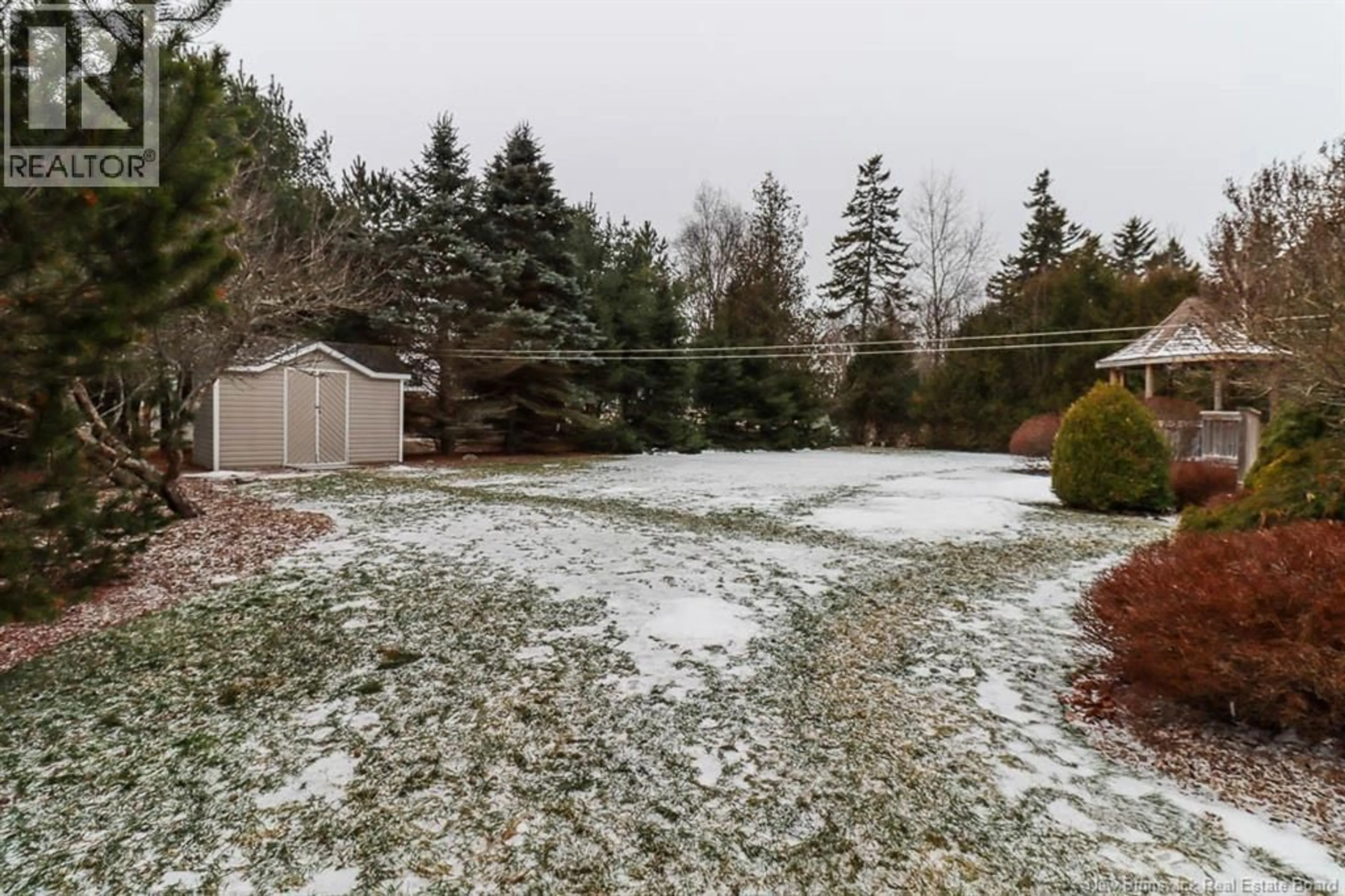 A pic from outside/outdoor area/front of a property/back of a property/a pic from drone, street for 54 DONLYN DRIVE, Rothesay New Brunswick E2E4X6