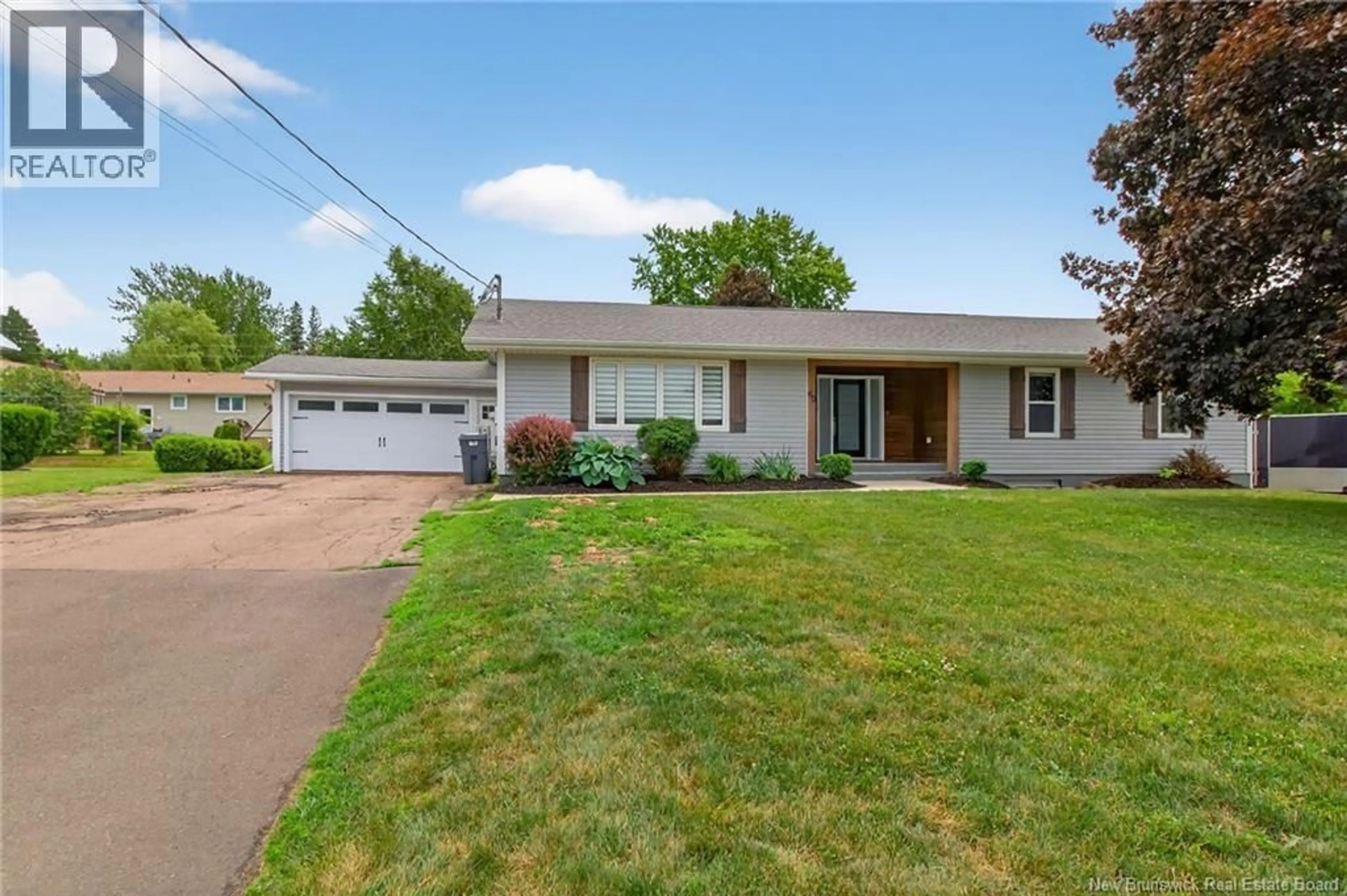 Home with vinyl exterior material, street for 60-62 AVALON STREET, Dieppe New Brunswick E1A1J9