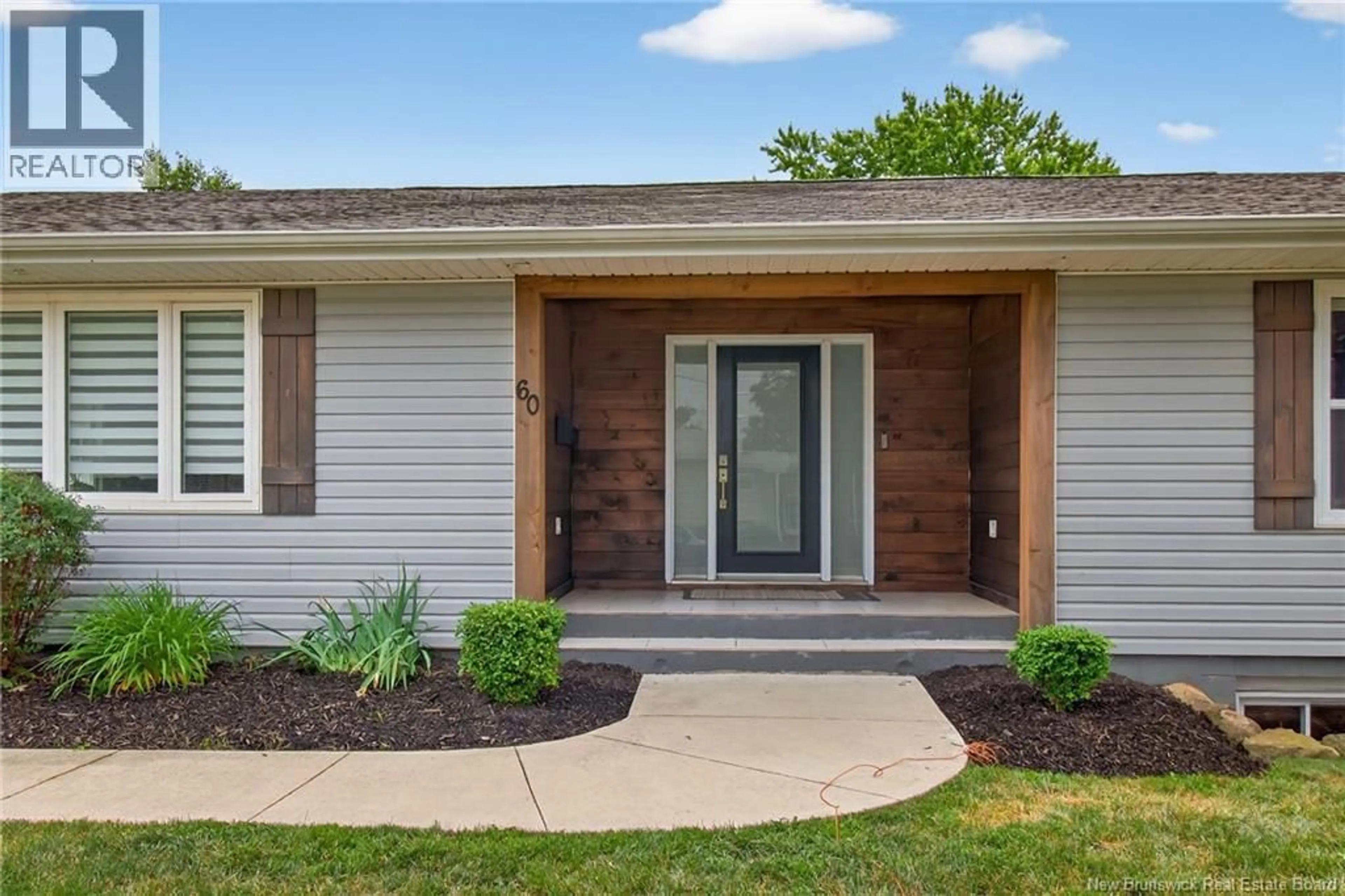 Home with vinyl exterior material, unknown for 60-62 AVALON STREET, Dieppe New Brunswick E1A1J9