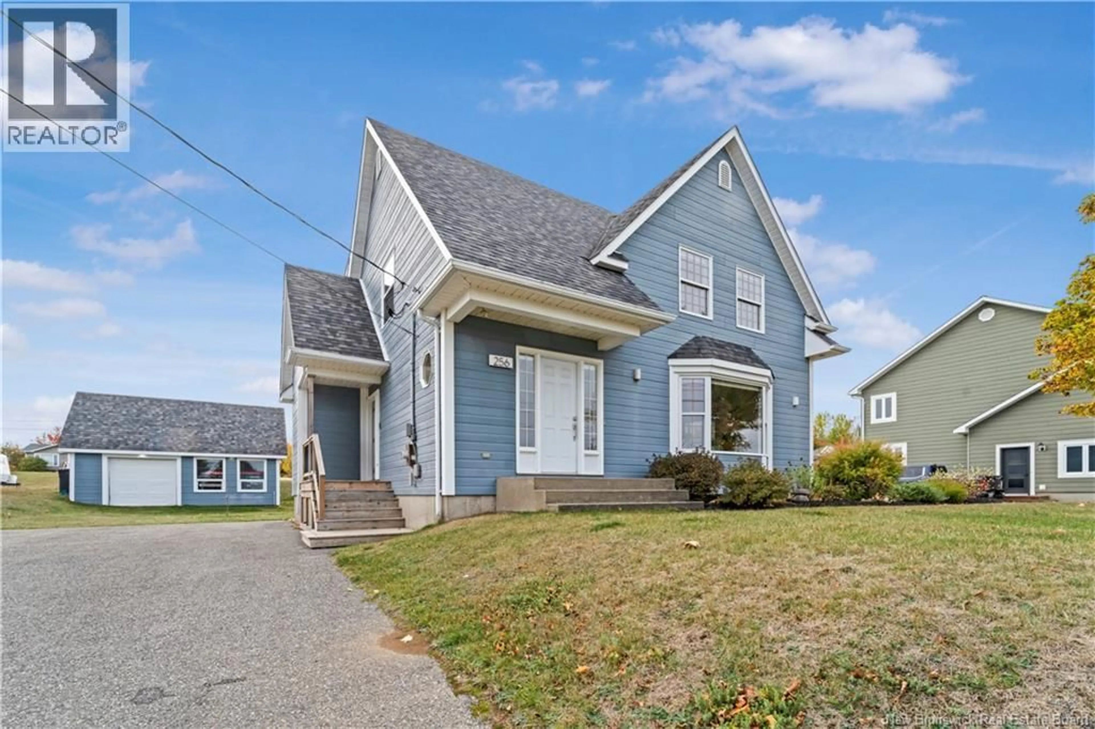 Home with vinyl exterior material, street for 256 FOULEM, Caraquet New Brunswick E1W1A4