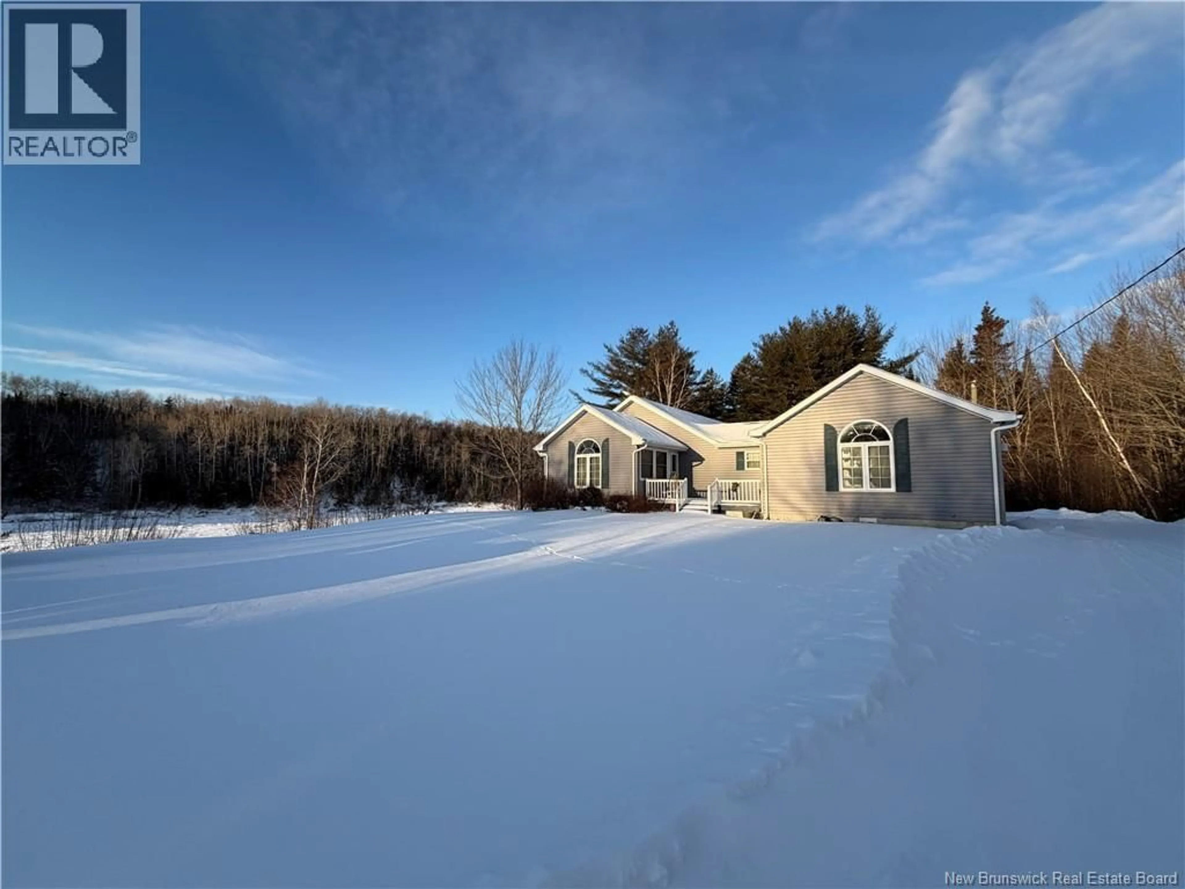 A pic from outside/outdoor area/front of a property/back of a property/a pic from drone, water/lake/river/ocean view for 1265 HWY 118, White Rapids New Brunswick E9B1B5