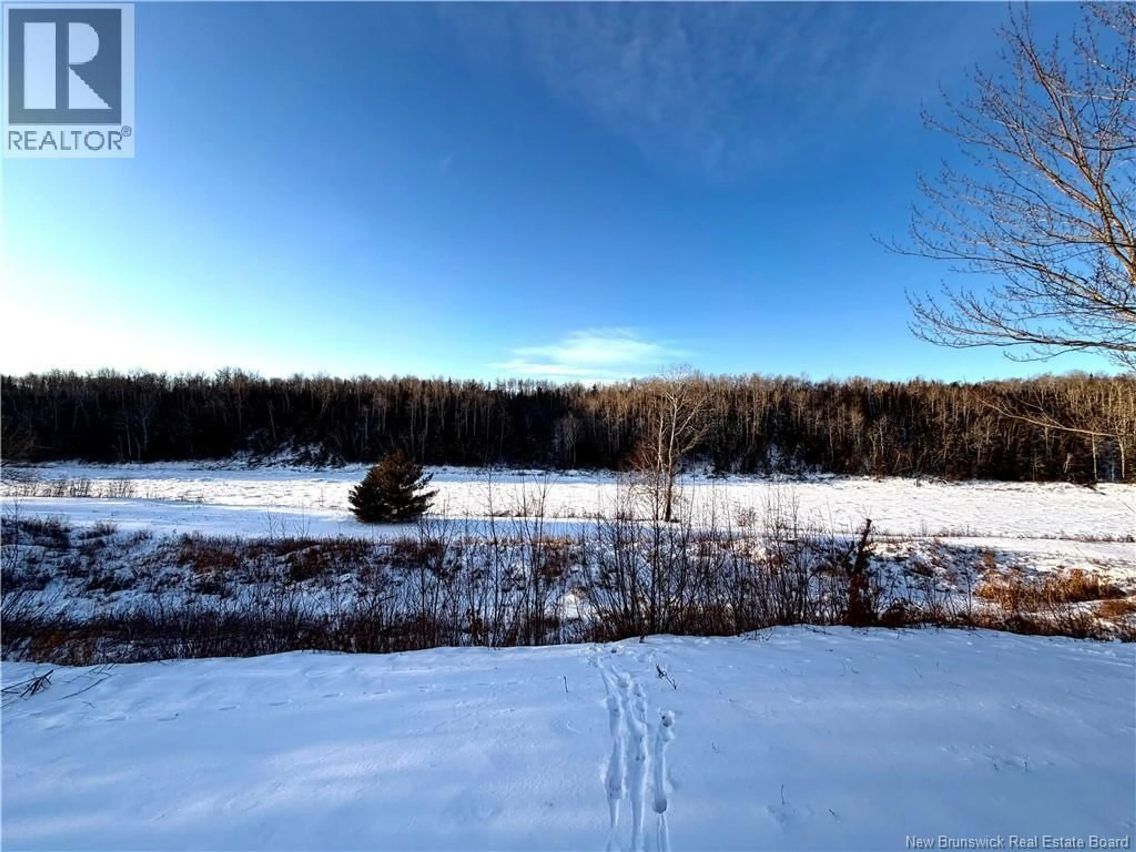 A pic from outside/outdoor area/front of a property/back of a property/a pic from drone, water/lake/river/ocean view for 1265 HWY 118, White Rapids New Brunswick E9B1B5