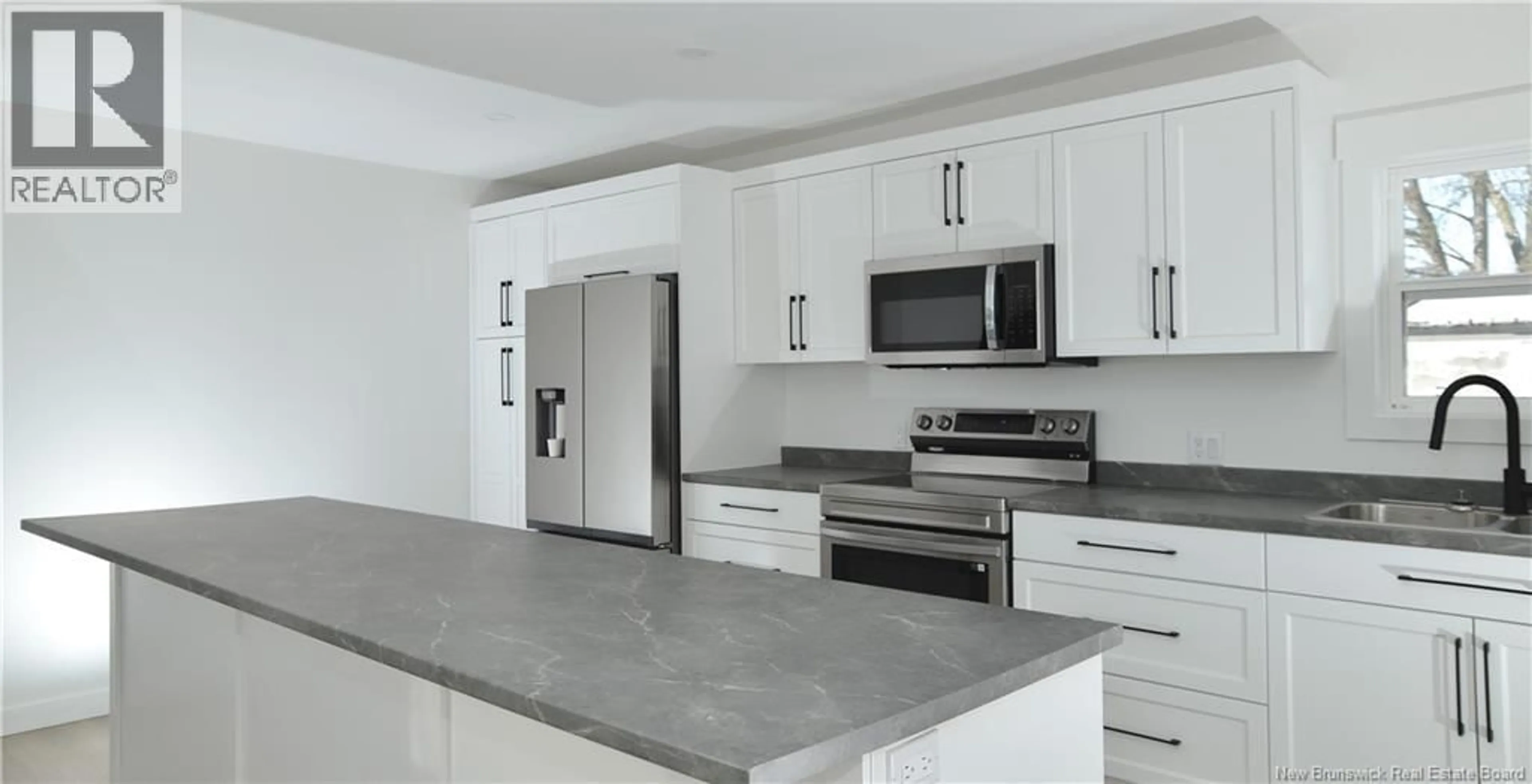 Open concept kitchen, ceramic/tile floor for 200 JUBILEE STREET, Shediac New Brunswick E4P1X5