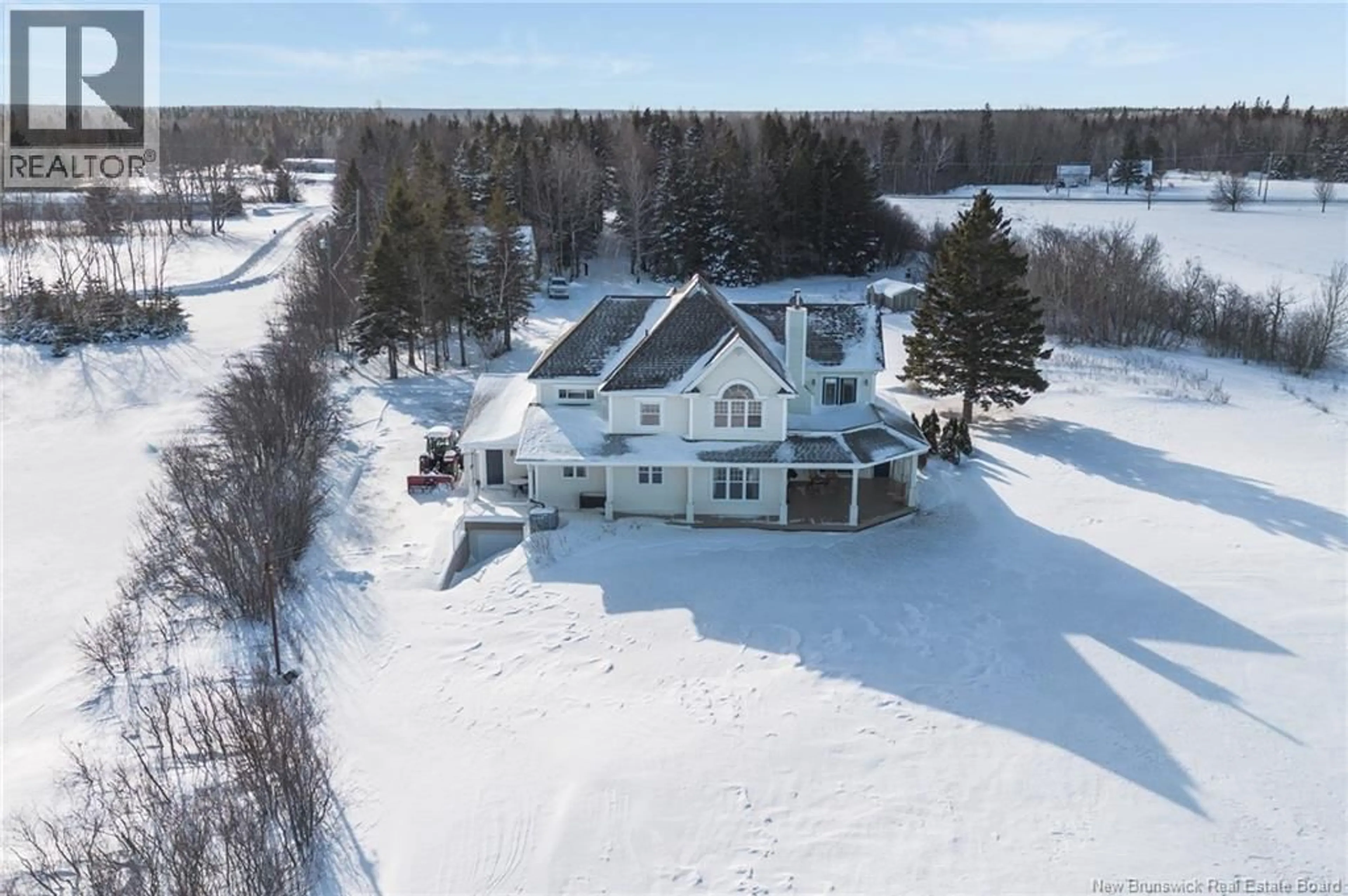 A pic from outside/outdoor area/front of a property/back of a property/a pic from drone, unknown for 218 MAIN, Belledune New Brunswick E8G2L7