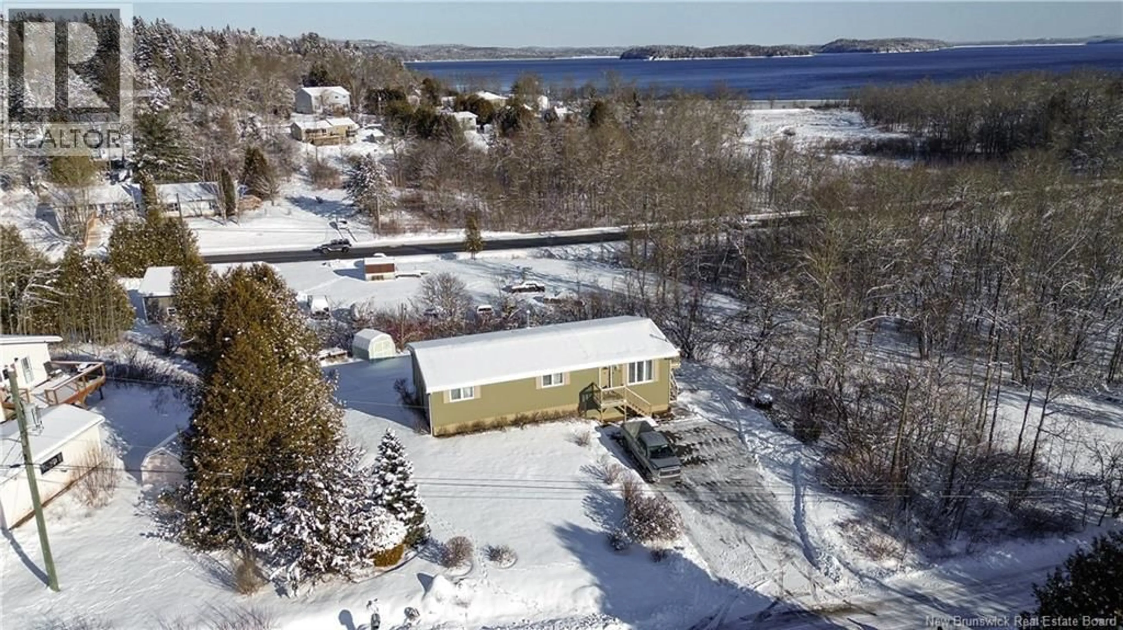 A pic from outside/outdoor area/front of a property/back of a property/a pic from drone, water/lake/river/ocean view for 50 MELLINGER CRESCENT, Saint John New Brunswick E2M6S8