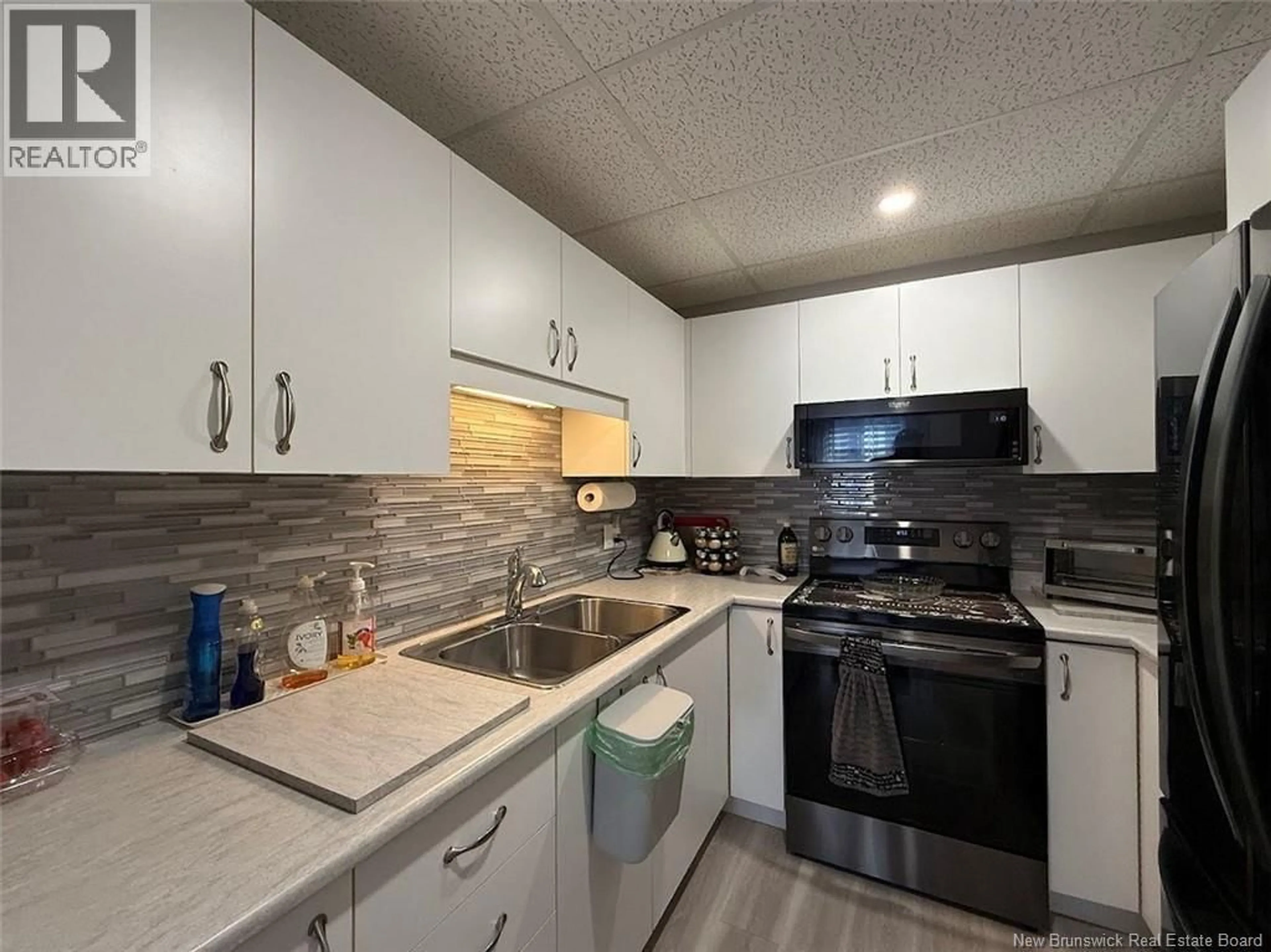 Standard kitchen, ceramic/tile floor for 9 SACRE-COEUR AVENUE, Edmundston New Brunswick E3V4E3