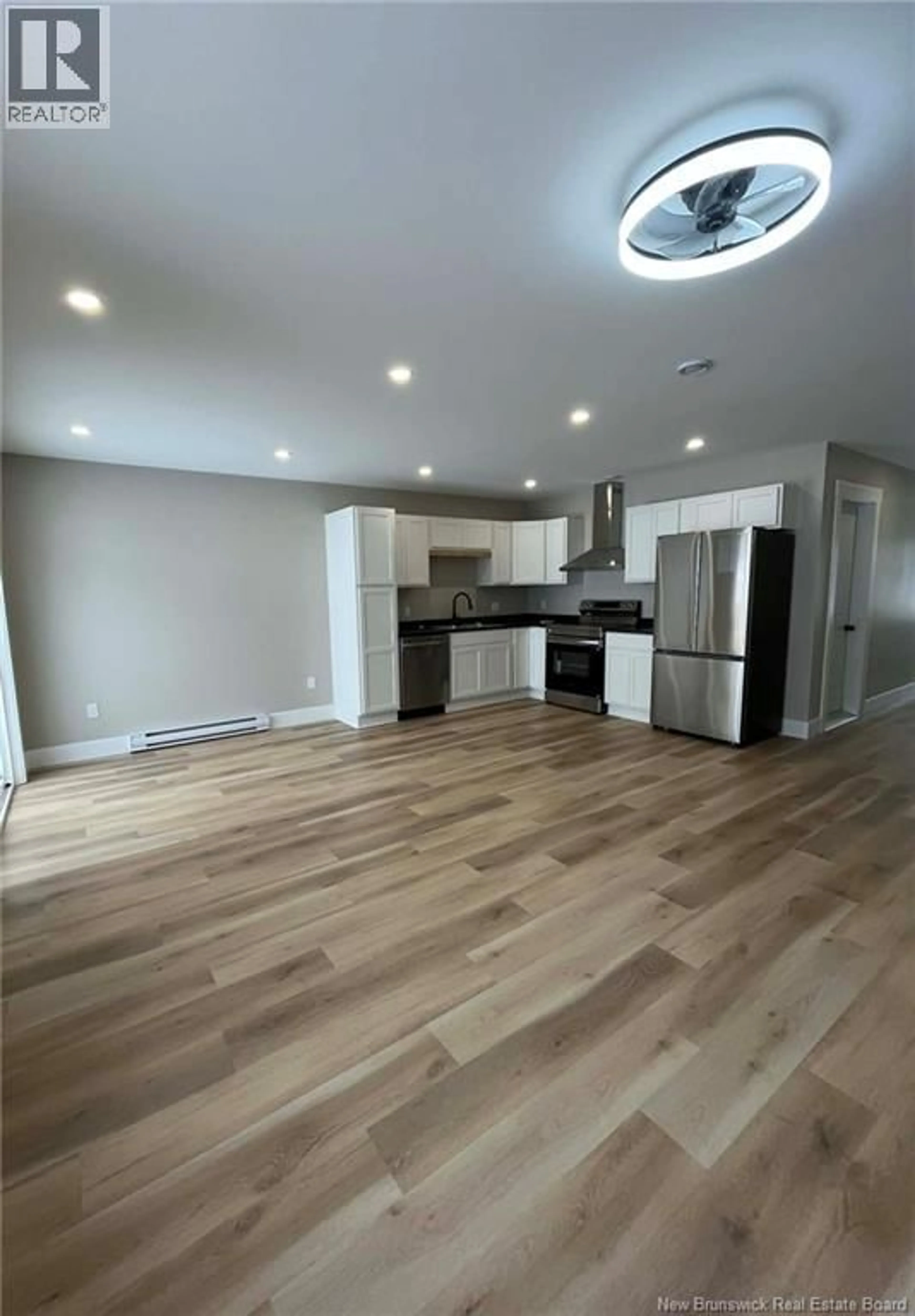 Open concept kitchen, wood/laminate floor for 177 ARLINGTON CRESCENT, Saint John New Brunswick E2K0G4