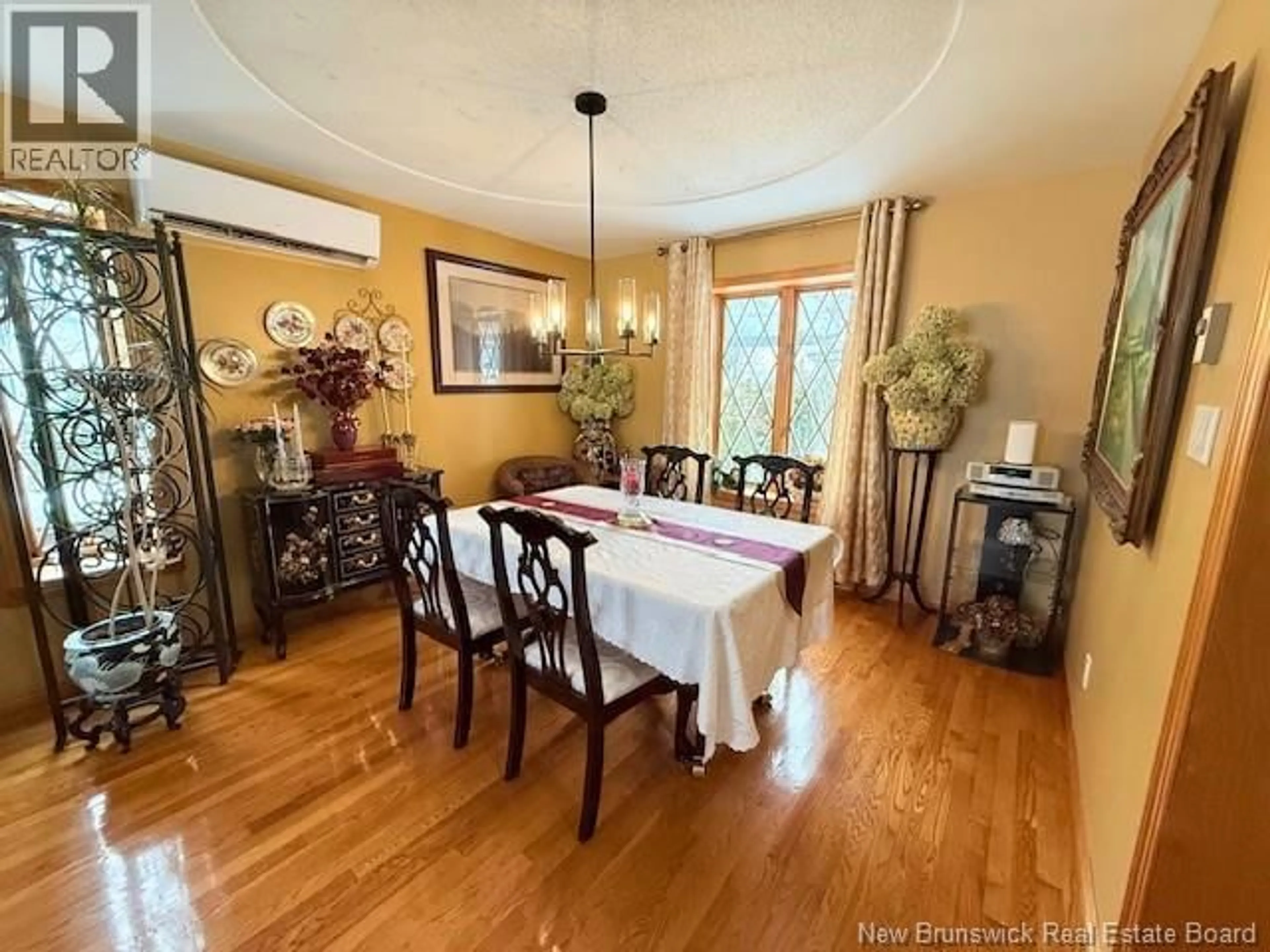 Dining room, wood/laminate floor for 14 ASPEN DRIVE, Campbellton New Brunswick E3N3S9