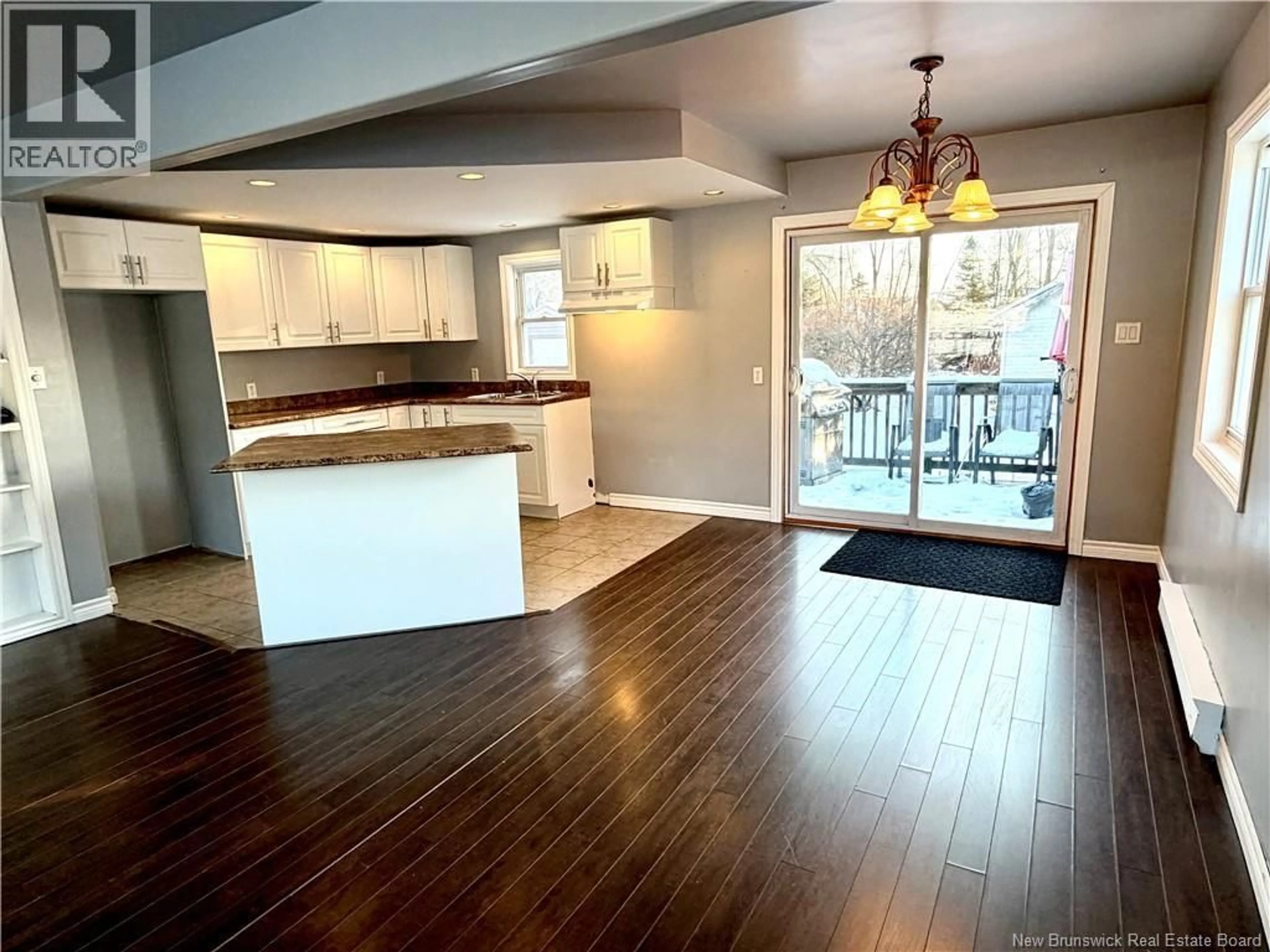 Open concept kitchen, wood/laminate floor for 86 GLEN ROAD, Saint John New Brunswick E2H2E1