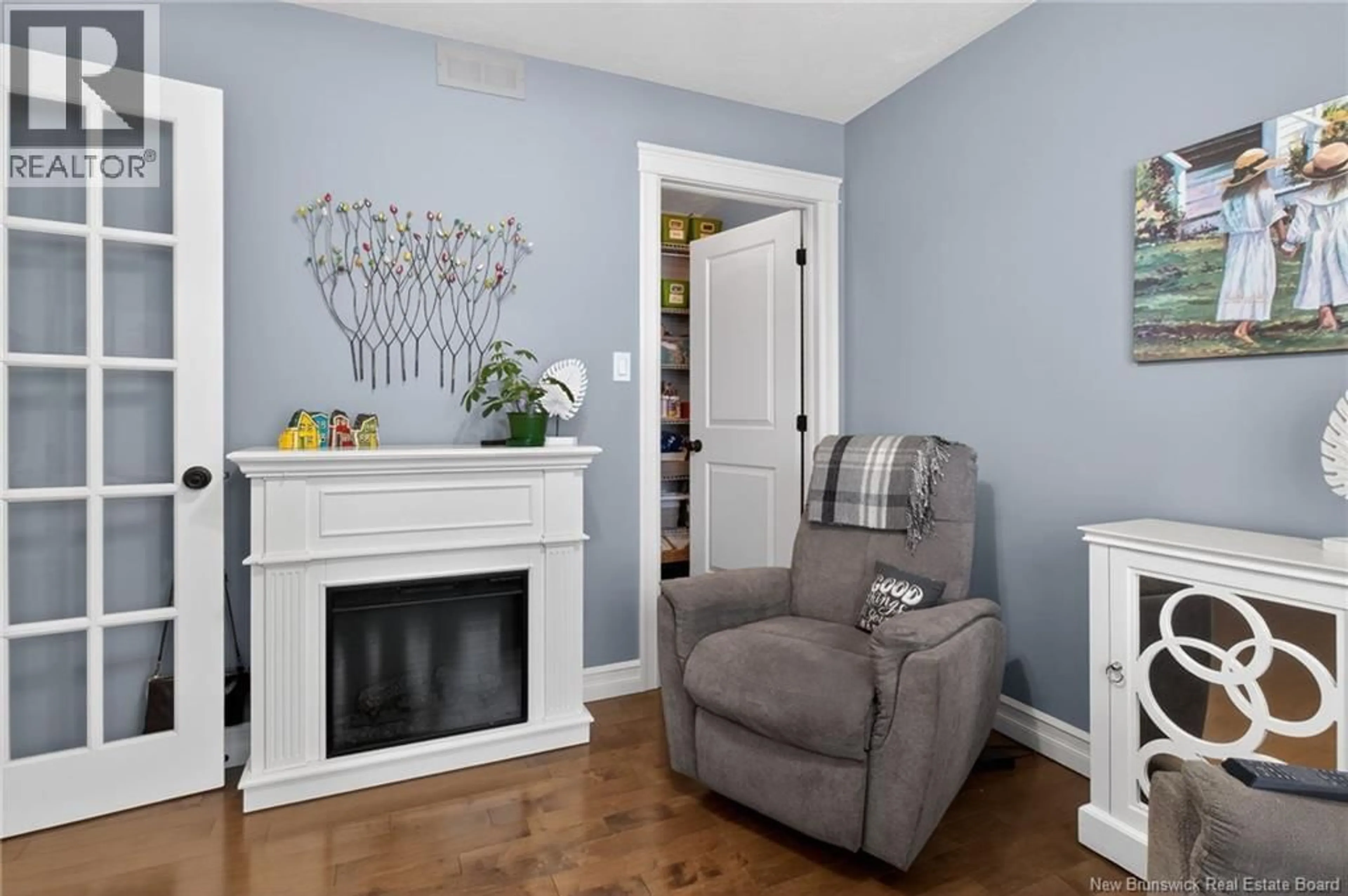 Living room with furniture, wood/laminate floor for 18 ANASTASIA CRESCENT, Moncton New Brunswick E1E0E4