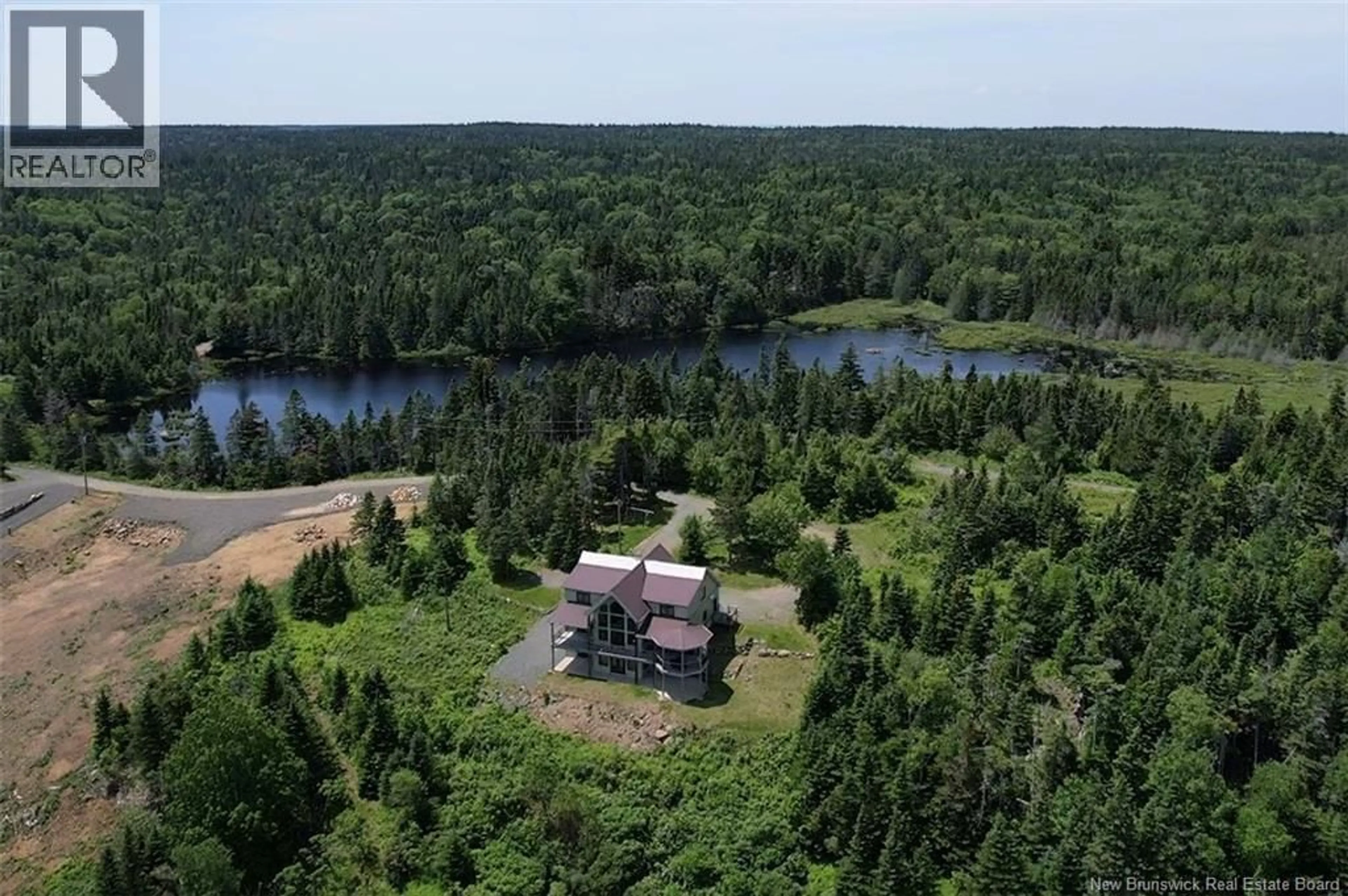A pic from outside/outdoor area/front of a property/back of a property/a pic from drone, water/lake/river/ocean view for 60 OHIO POND ROAD, Grand Manan New Brunswick E5G4B4
