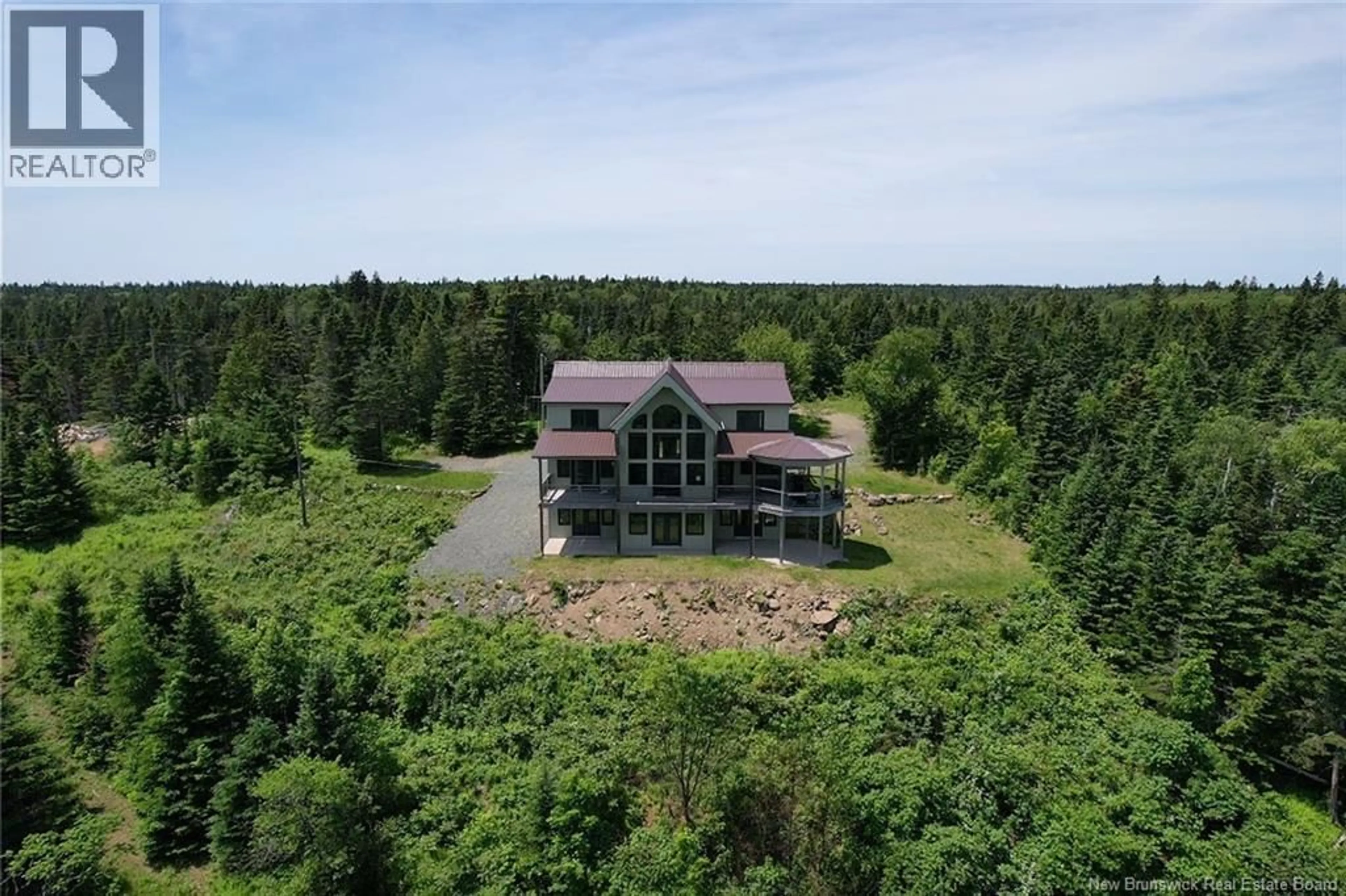 A pic from outside/outdoor area/front of a property/back of a property/a pic from drone, unknown for 60 OHIO POND ROAD, Grand Manan New Brunswick E5G4B4