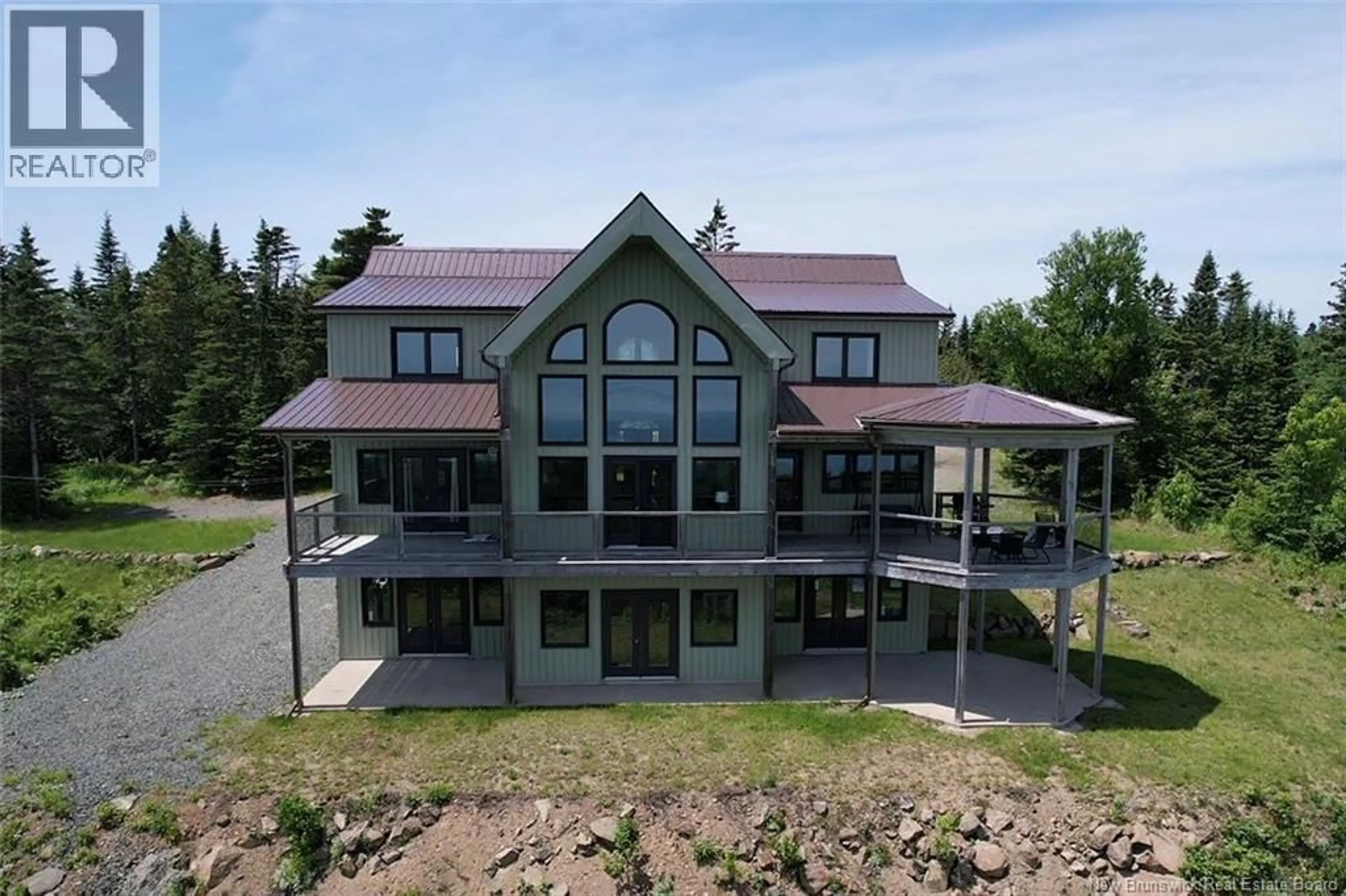A pic from outside/outdoor area/front of a property/back of a property/a pic from drone, building for 60 OHIO POND ROAD, Grand Manan New Brunswick E5G4B4