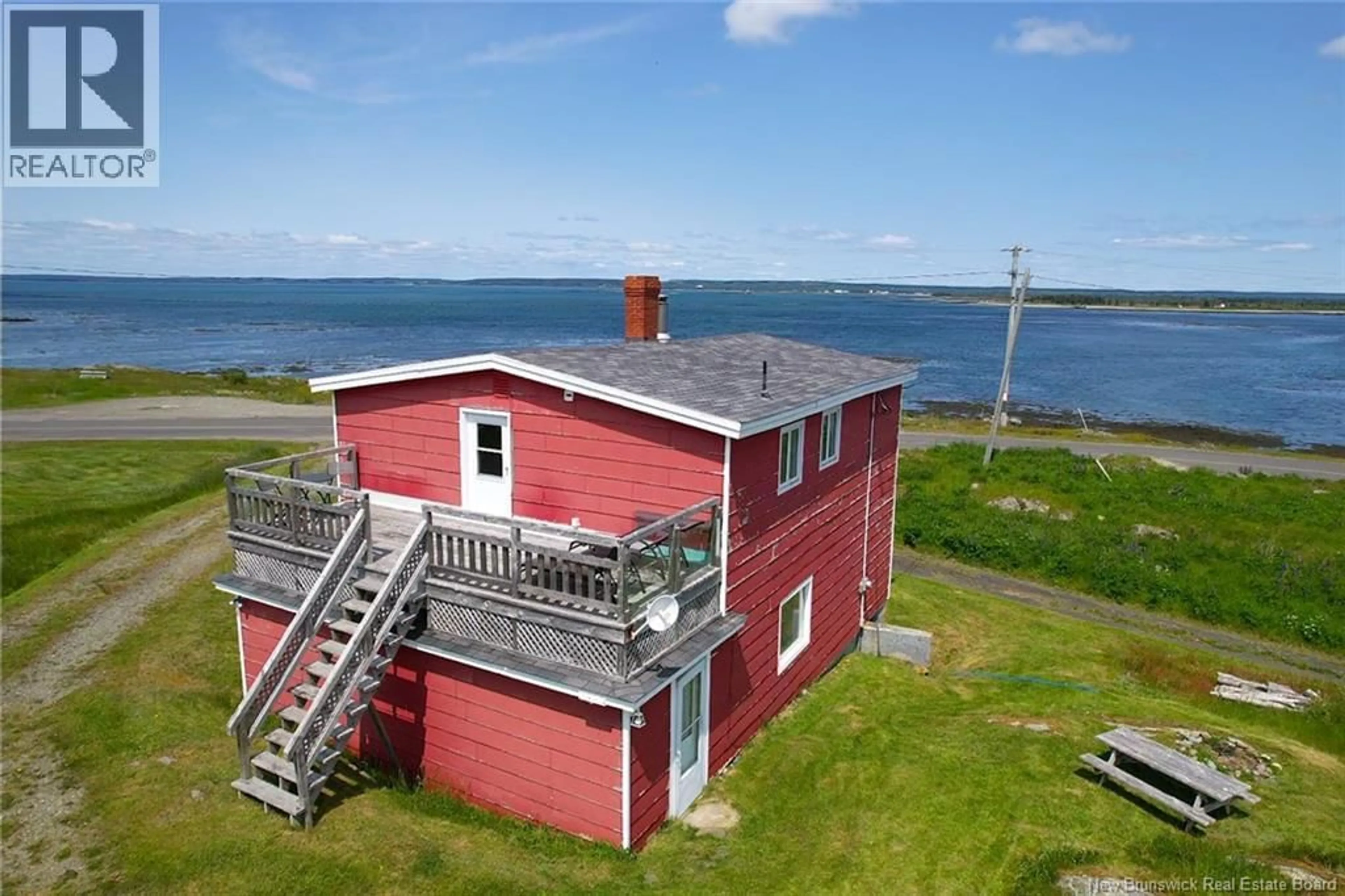 A pic from outside/outdoor area/front of a property/back of a property/a pic from drone, water/lake/river/ocean view for 246 WHITE HEAD ROAD, White Head Island New Brunswick E5G1K6