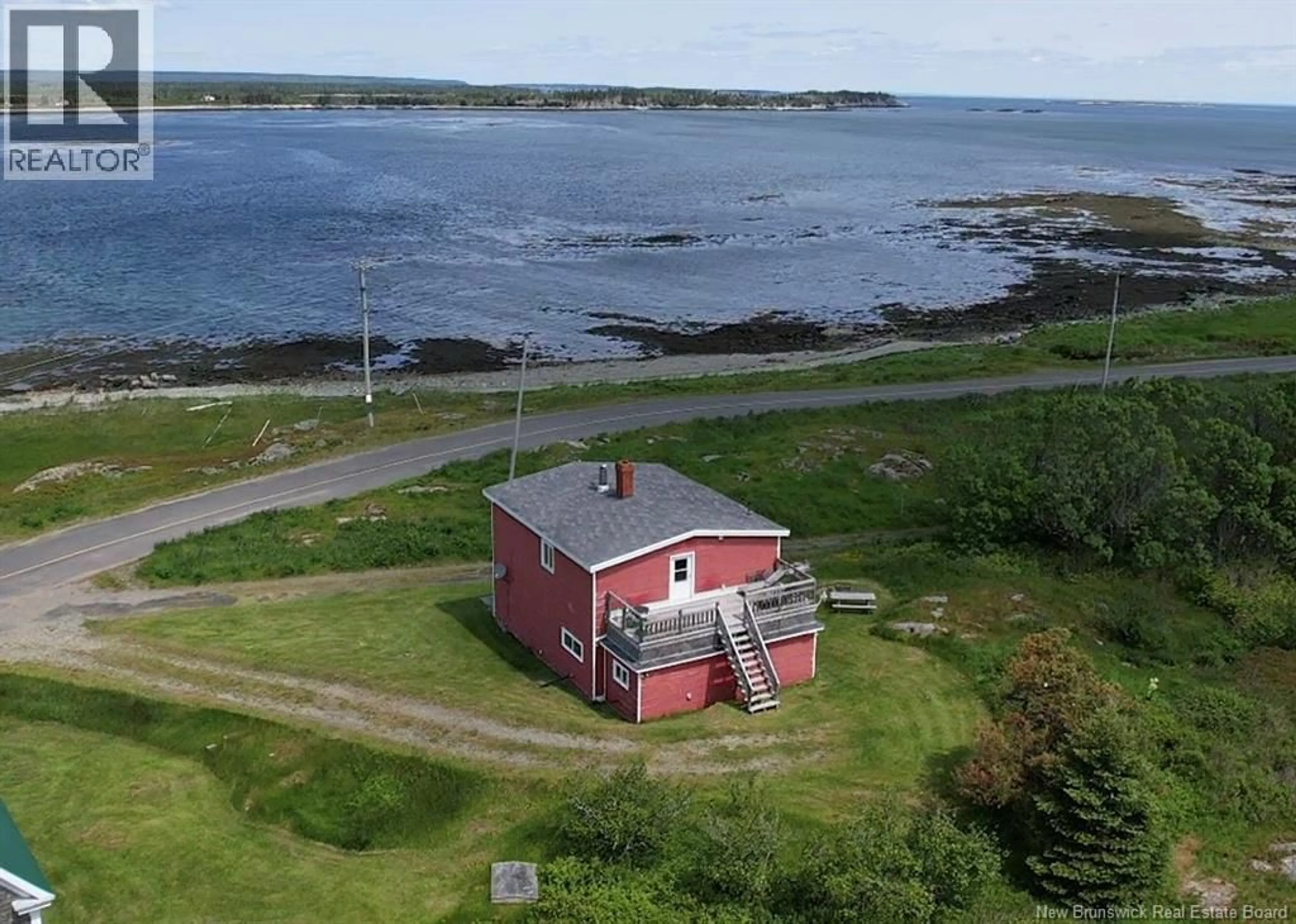 A pic from outside/outdoor area/front of a property/back of a property/a pic from drone, building for 246 WHITE HEAD ROAD, White Head Island New Brunswick E5G1K6