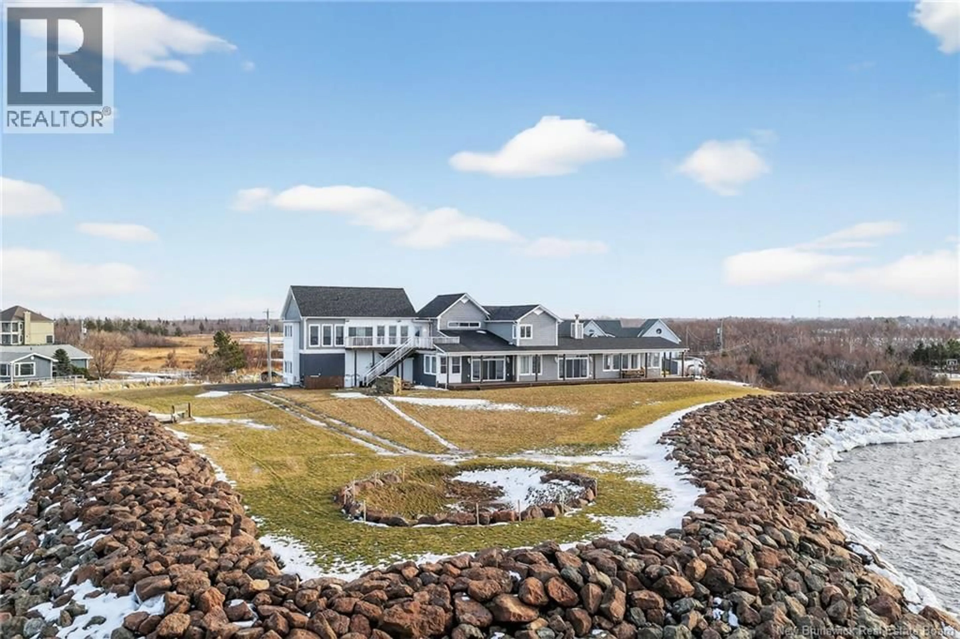 A pic from outside/outdoor area/front of a property/back of a property/a pic from drone, water/lake/river/ocean view for 75 P'TIT BARACHOIS ROAD, Grand-Barachois New Brunswick E4P7Y2