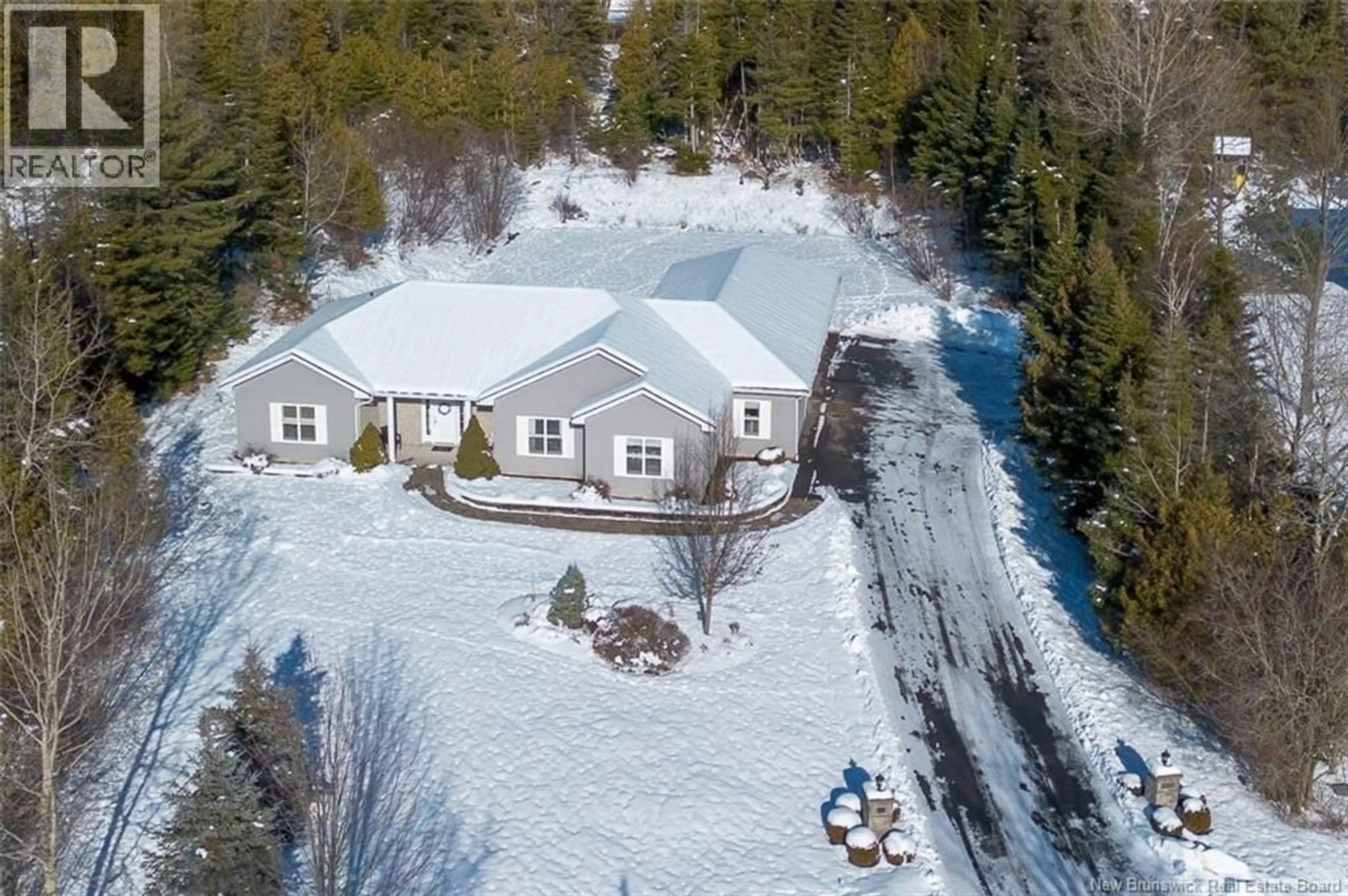 A pic from outside/outdoor area/front of a property/back of a property/a pic from drone, street for 10 MALISEET DRIVE, Rothesay New Brunswick E2E2G6