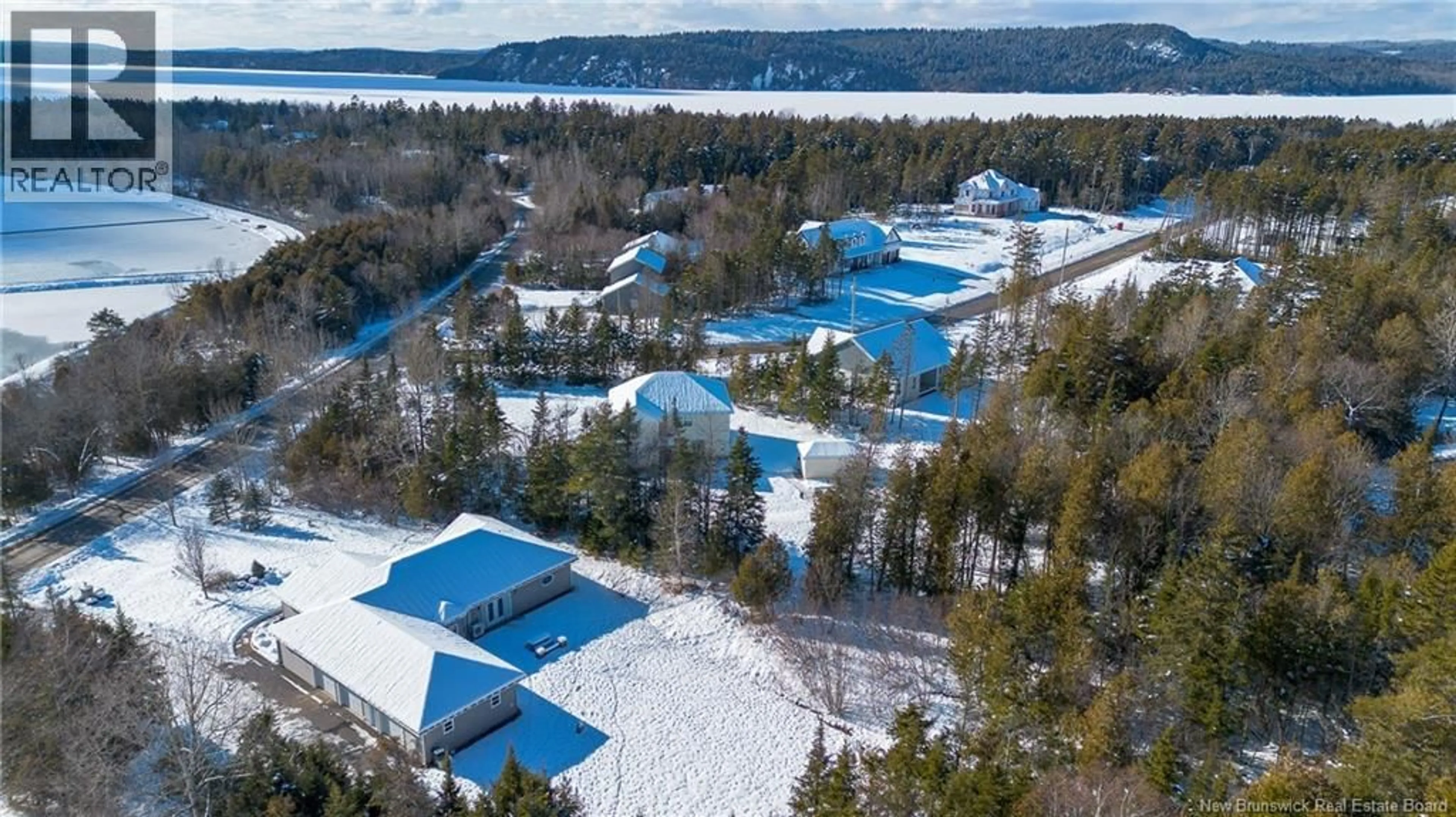 A pic from outside/outdoor area/front of a property/back of a property/a pic from drone, water/lake/river/ocean view for 10 MALISEET DRIVE, Rothesay New Brunswick E2E2G6