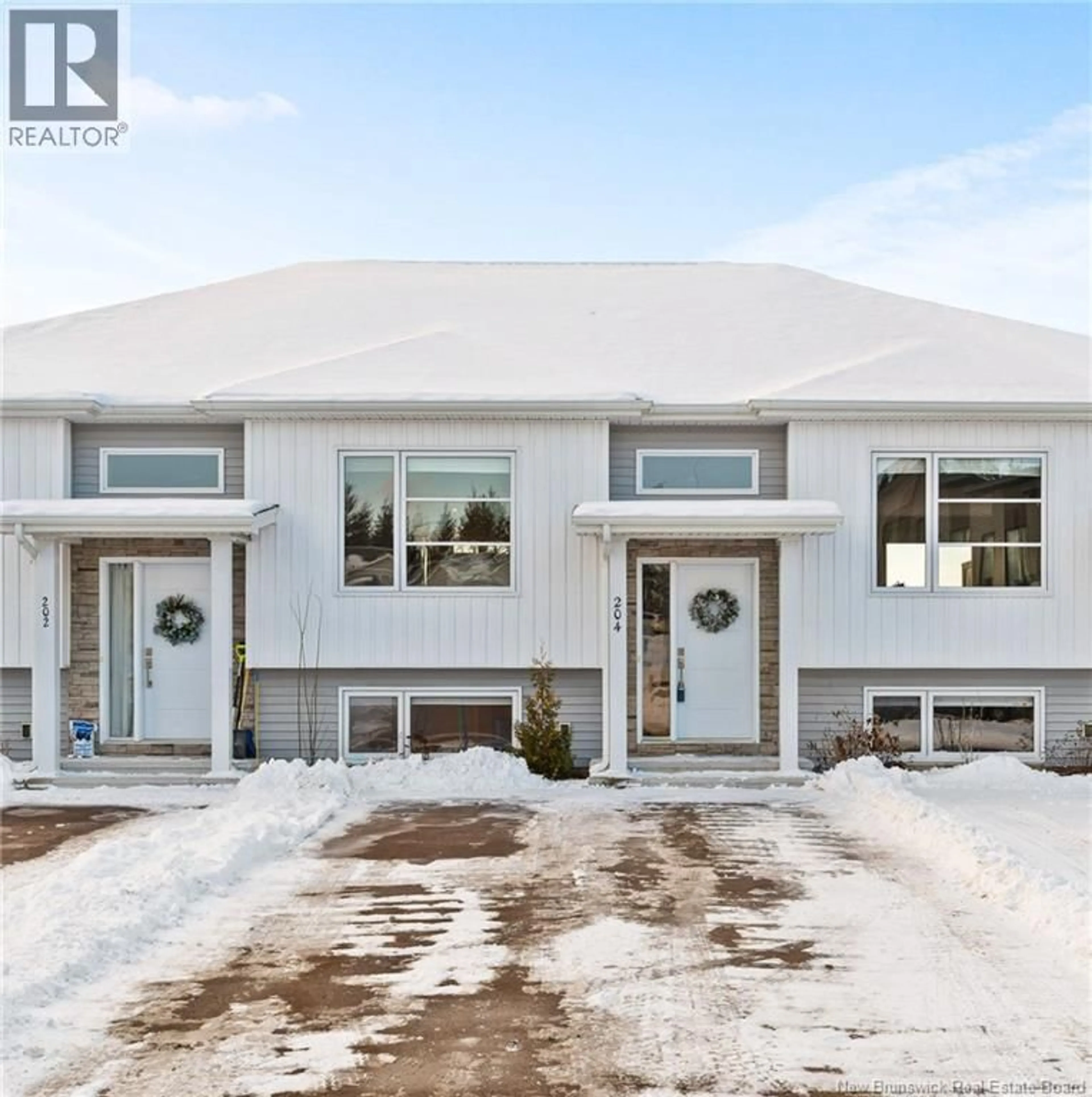 Home with vinyl exterior material, street for 204 HERMAN STREET, Dieppe New Brunswick E1A7G7