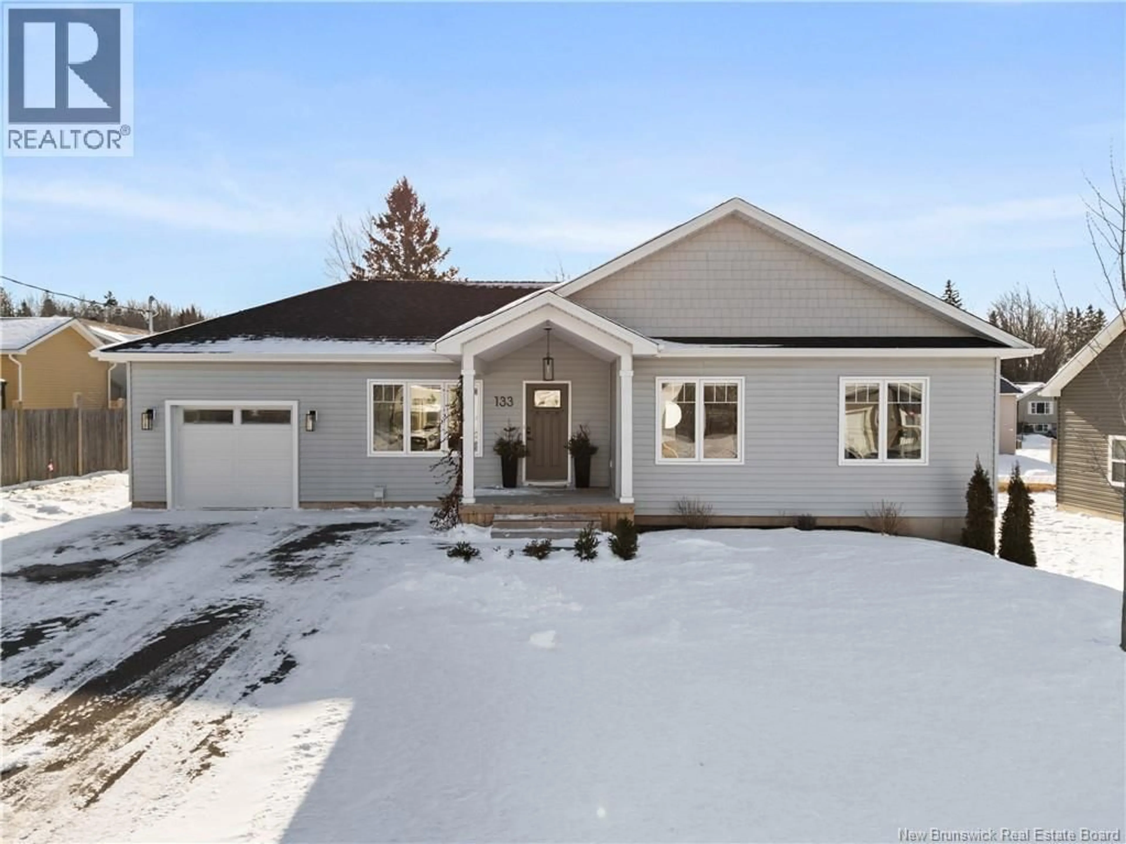 Home with vinyl exterior material, street for 133 DOIRON STREET, Dieppe New Brunswick E1A0X9