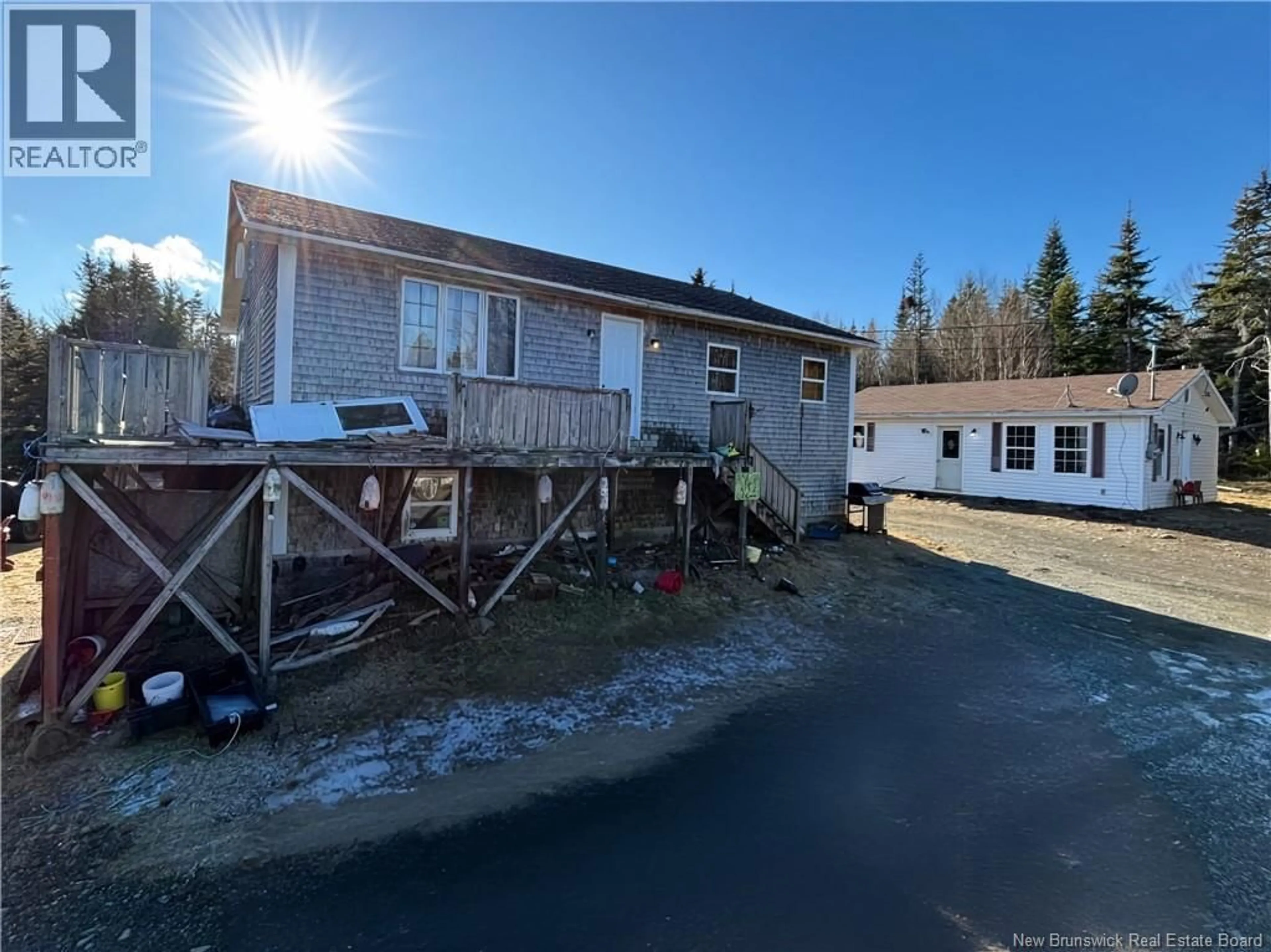 A pic from outside/outdoor area/front of a property/back of a property/a pic from drone, unknown for 36 LEONARD DRIVE, Grand Manan New Brunswick E5G4C6