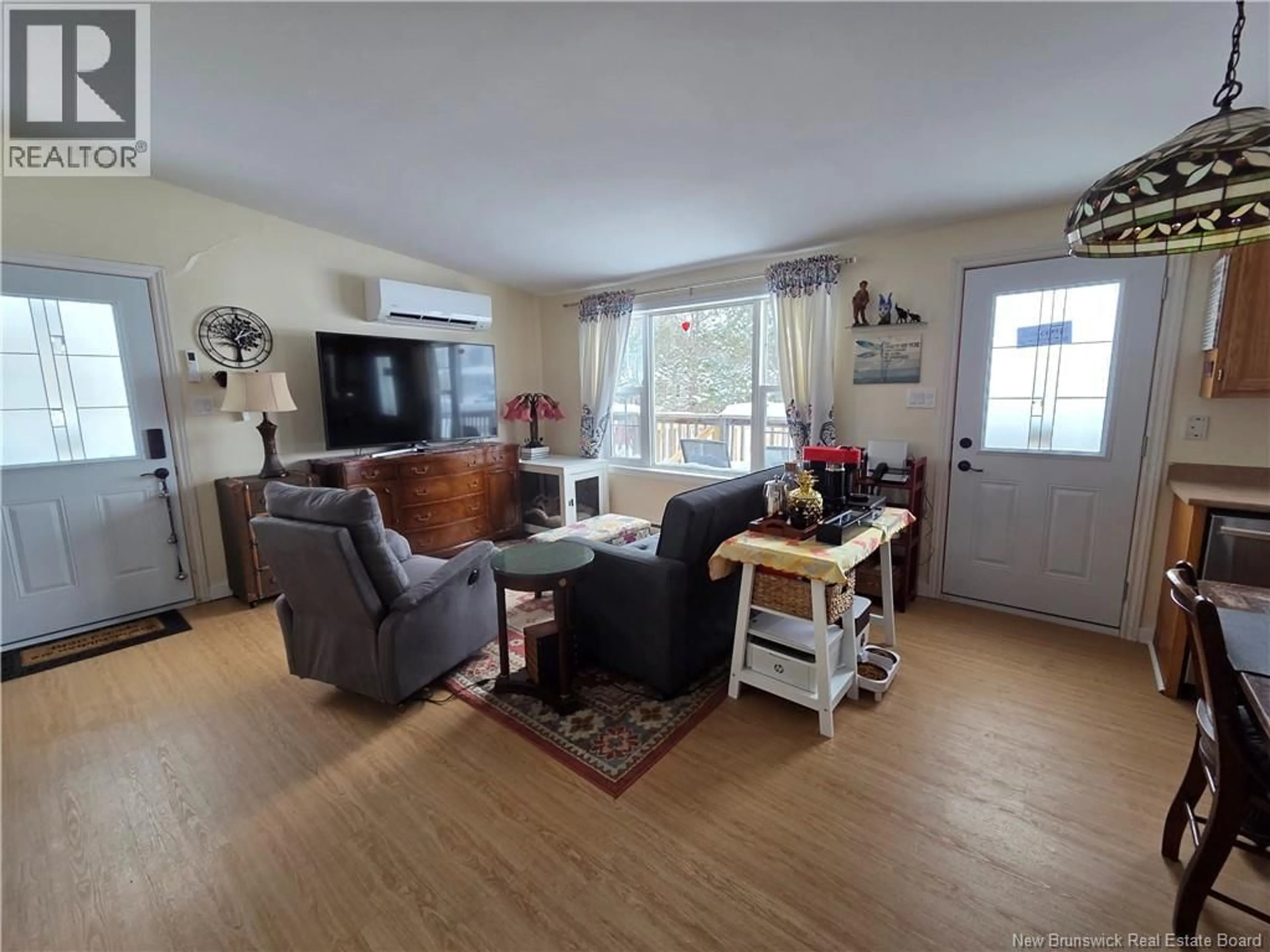 Living room with furniture, wood/laminate floor for 36 HAYWARD LANE, Riverview New Brunswick E1B5R2