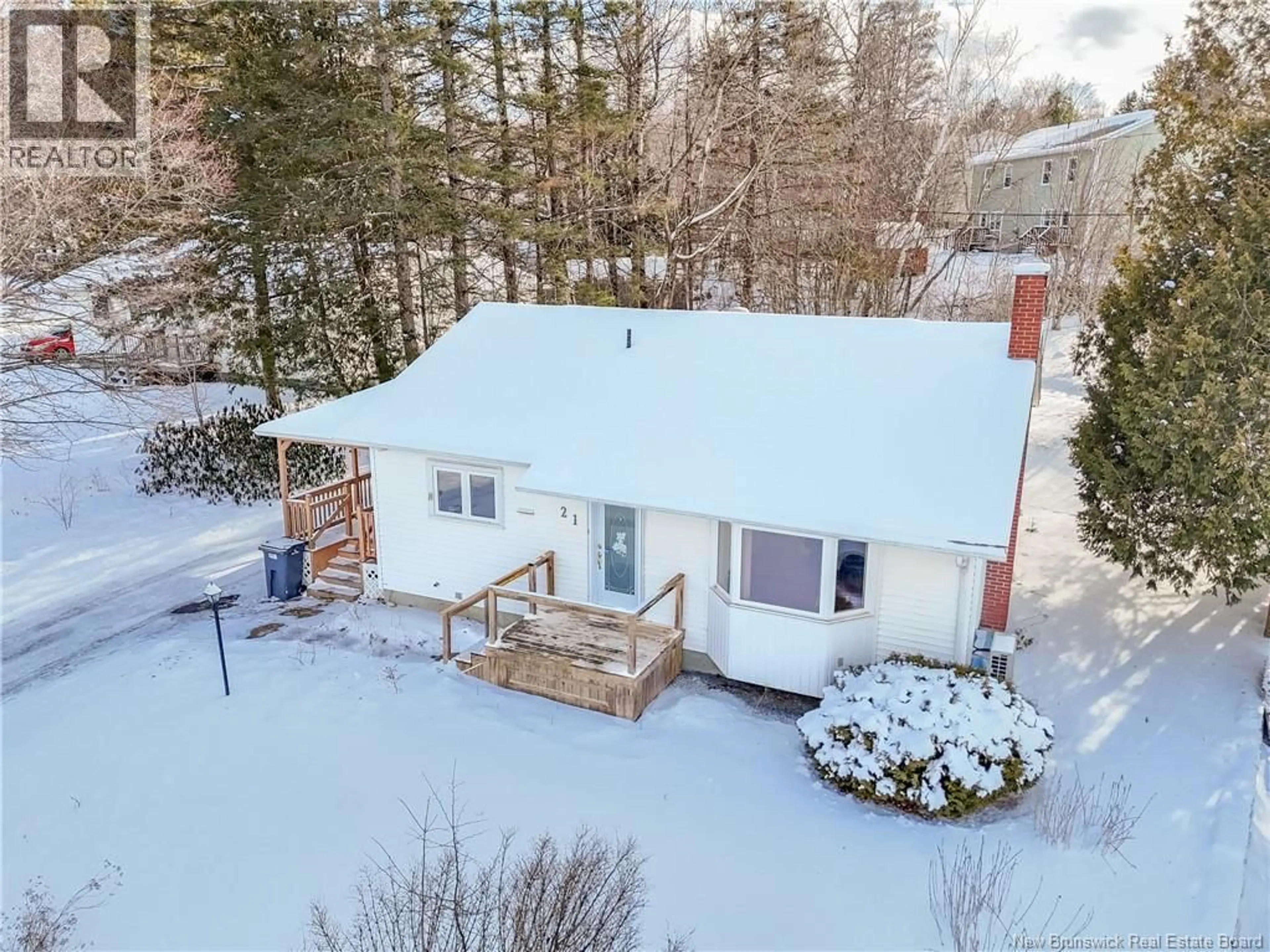 A pic from outside/outdoor area/front of a property/back of a property/a pic from drone, street for 21 WESTWOOD DRIVE, Fredericton New Brunswick E3C1K7