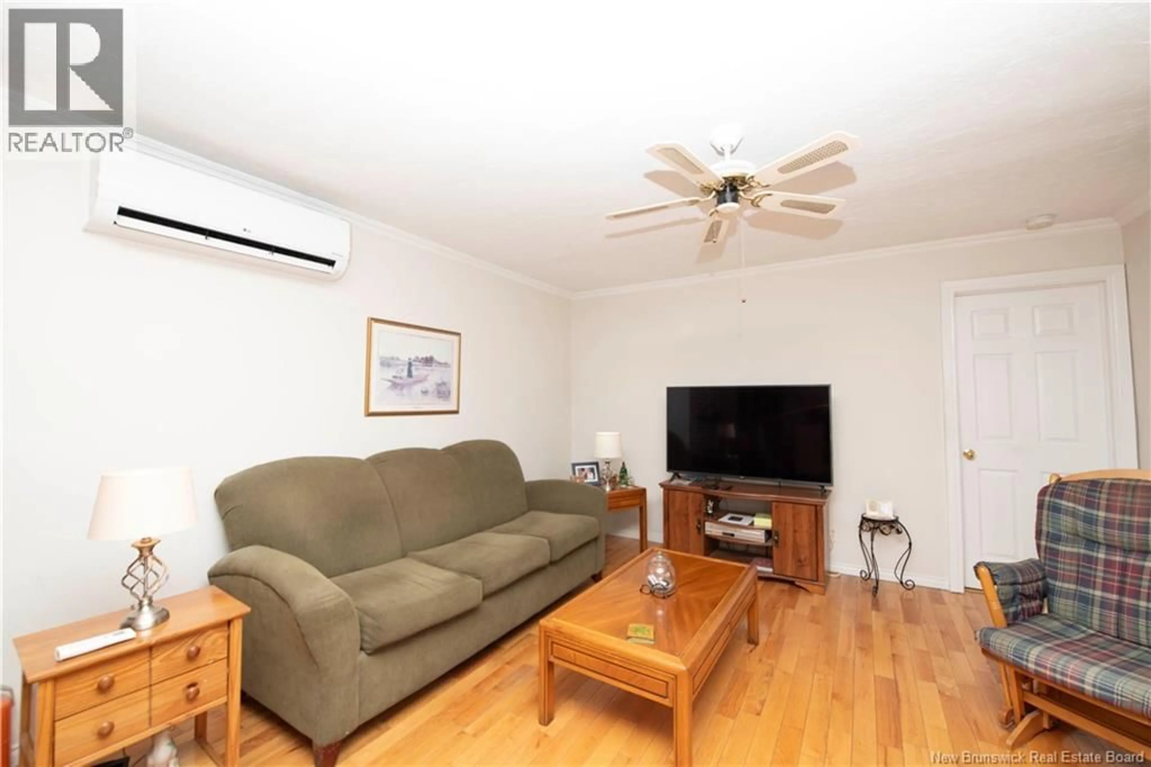 Living room with furniture, wood/laminate floor for 71 SCOTCH SETTLEMENT ROAD, Irishtown New Brunswick E1H1P6