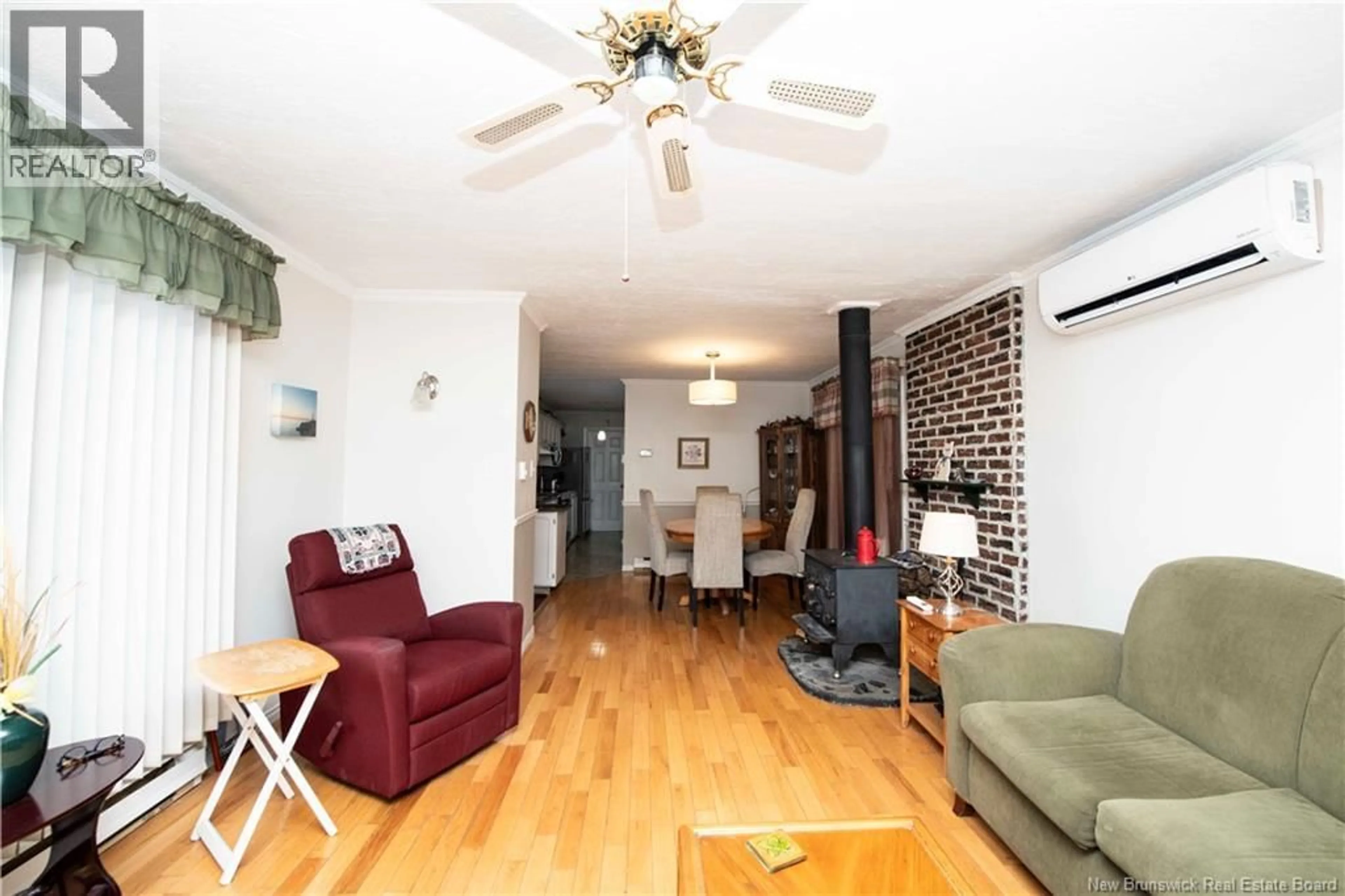 Living room with furniture, wood/laminate floor for 71 SCOTCH SETTLEMENT ROAD, Irishtown New Brunswick E1H1P6